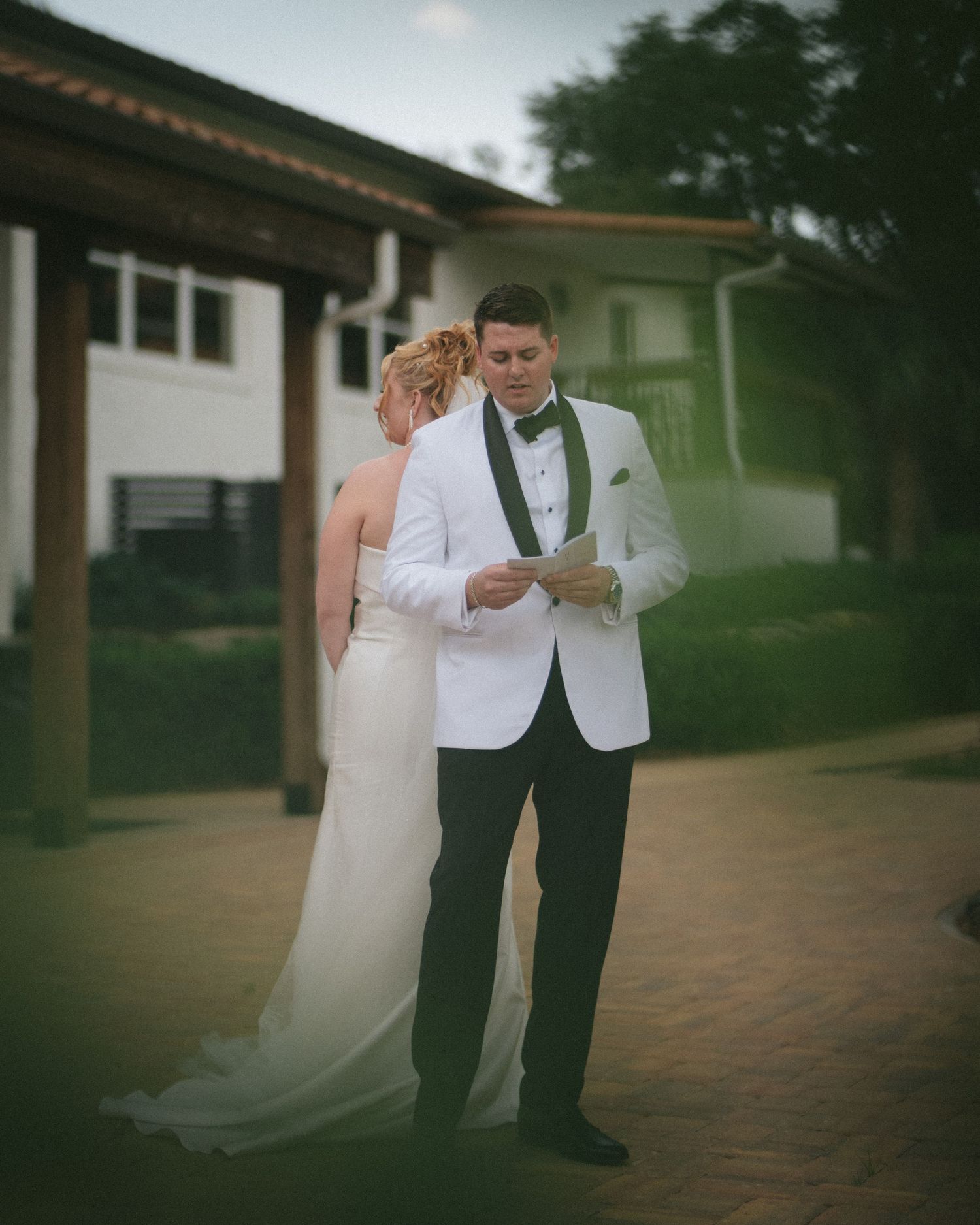 Wedding couple photographed in natural light
Bride and groom embracing during wedding day
Candid moment from a Florida wedding