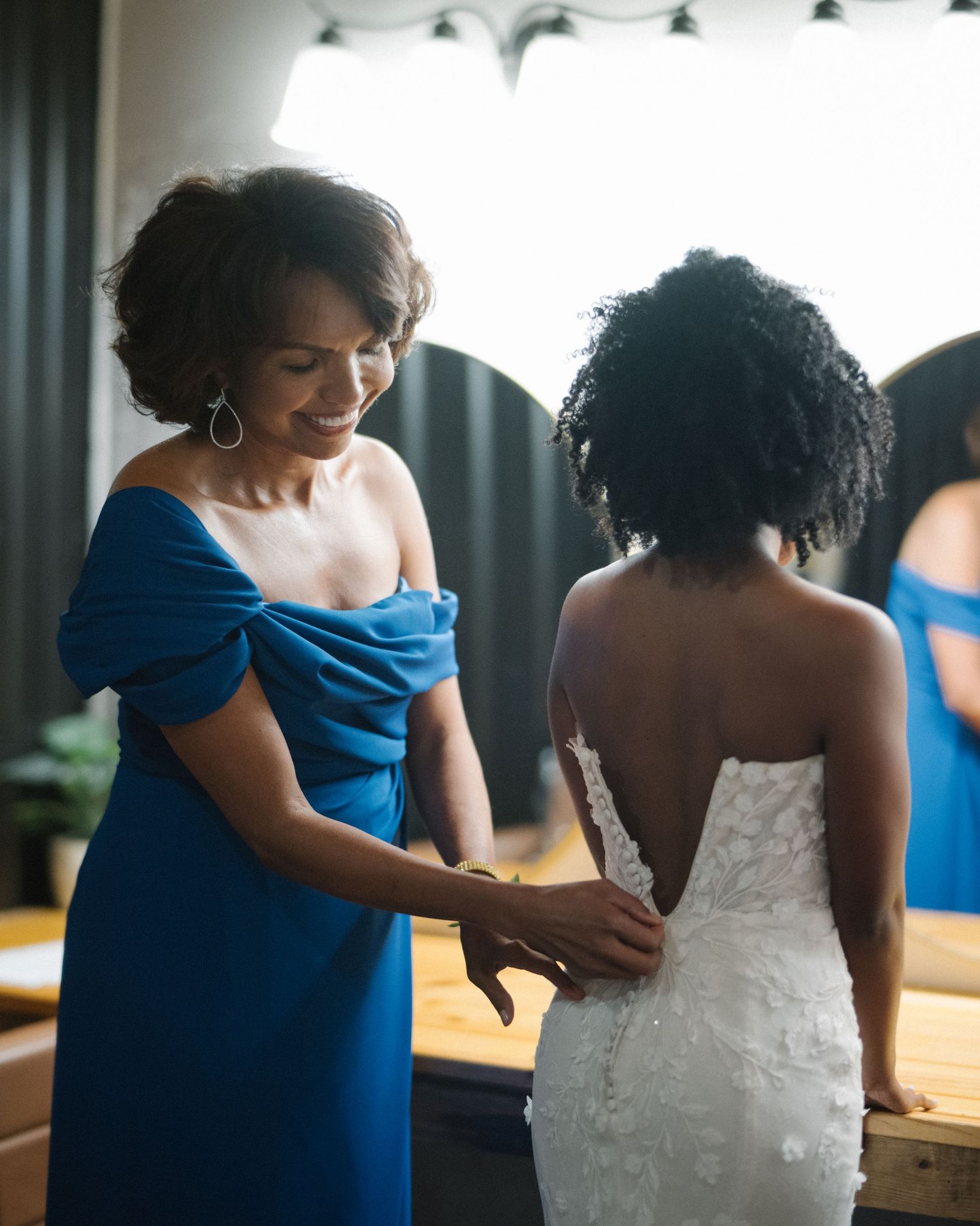Wedding couple photographed in natural light
Bride and groom embracing during wedding day
Candid moment from a Florida wedding