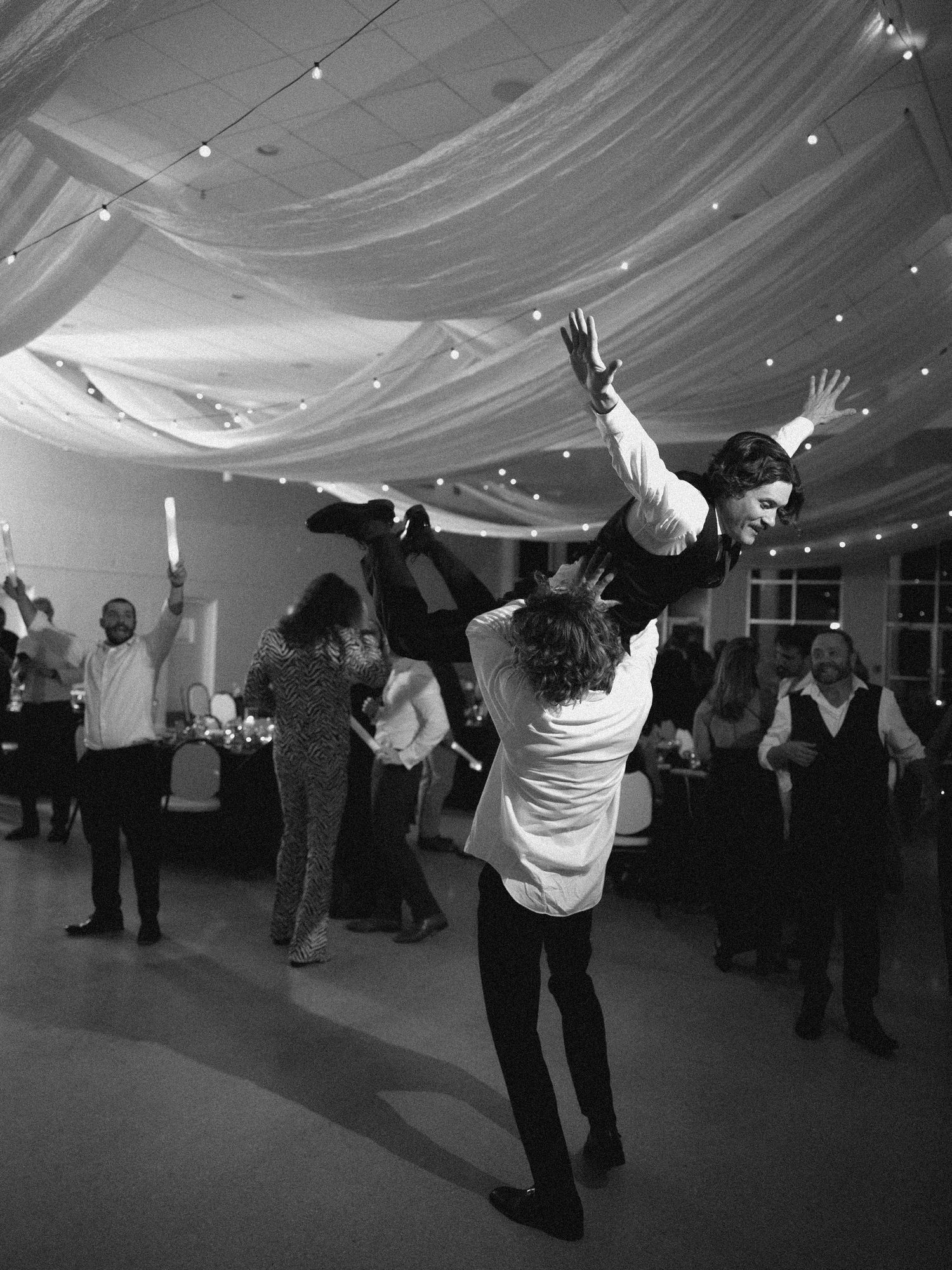 Wedding couple photographed in natural light
Bride and groom embracing during wedding day
Candid moment from a Florida wedding