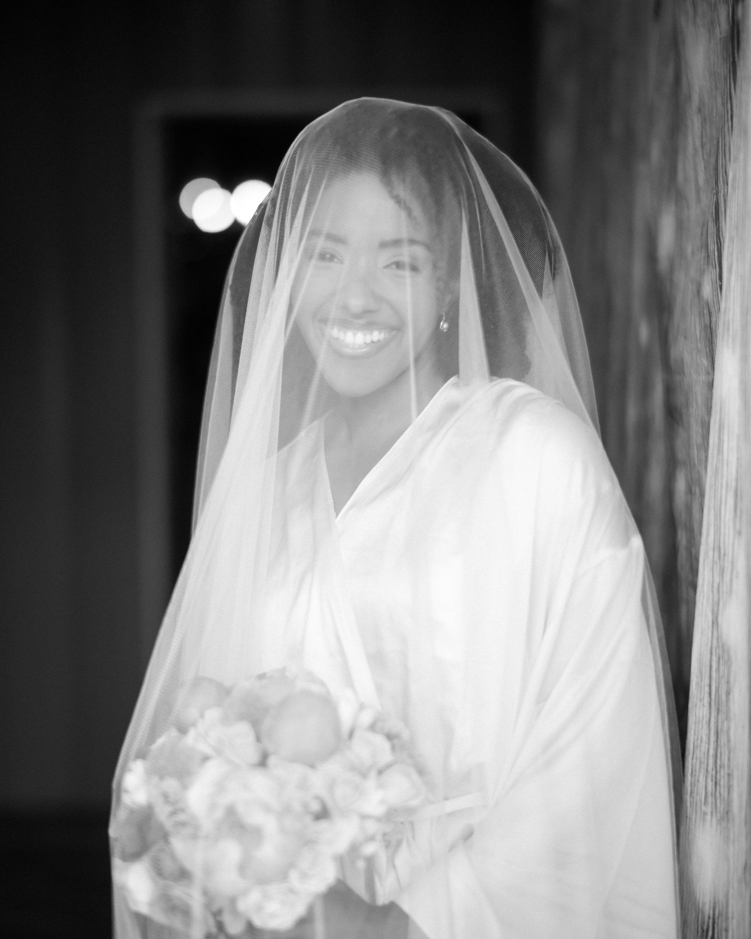 Wedding couple photographed in natural light
Bride and groom embracing during wedding day
Candid moment from a Florida wedding