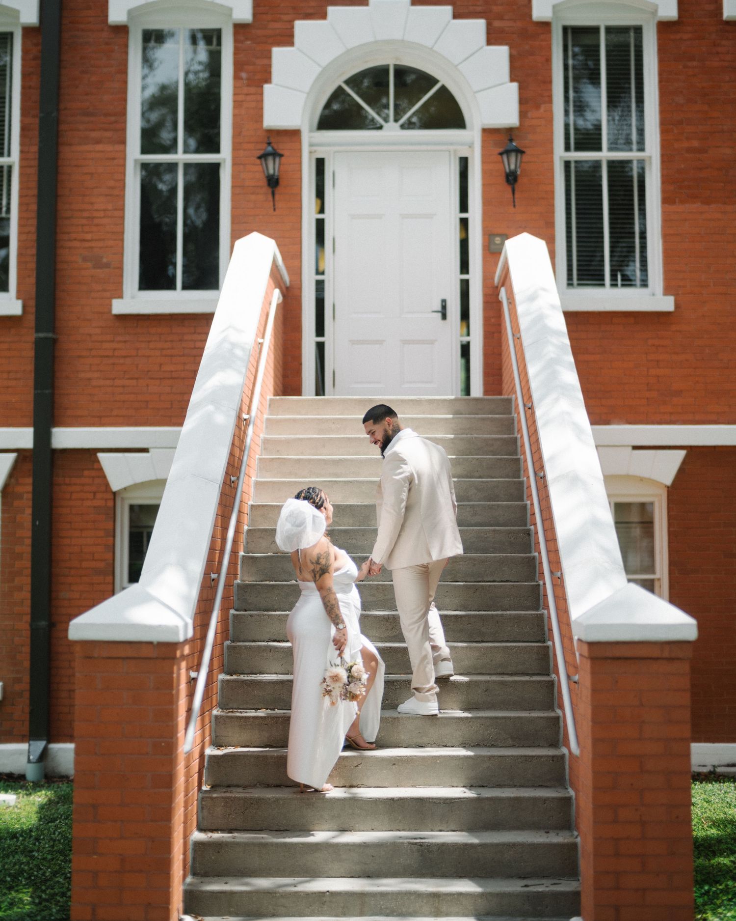 Wedding couple photographed in natural light
Bride and groom embracing during wedding day
Candid moment from a Florida wedding