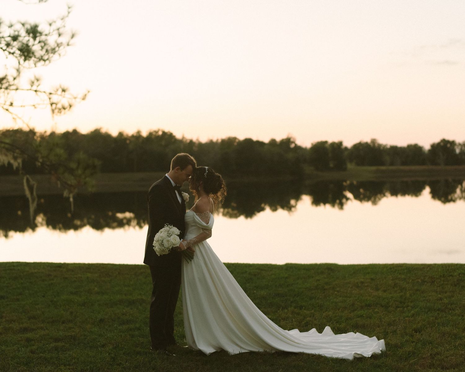 Wedding couple photographed in natural light
Bride and groom embracing during wedding day
Candid moment from a Florida wedding