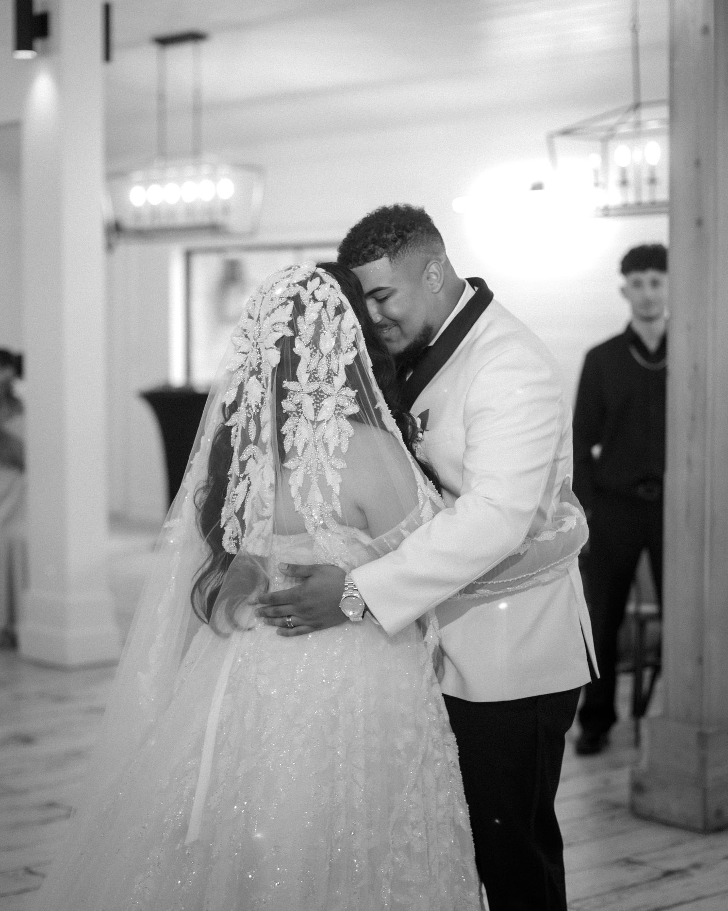 Wedding couple photographed in natural light
Bride and groom embracing during wedding day
Candid moment from a Florida wedding