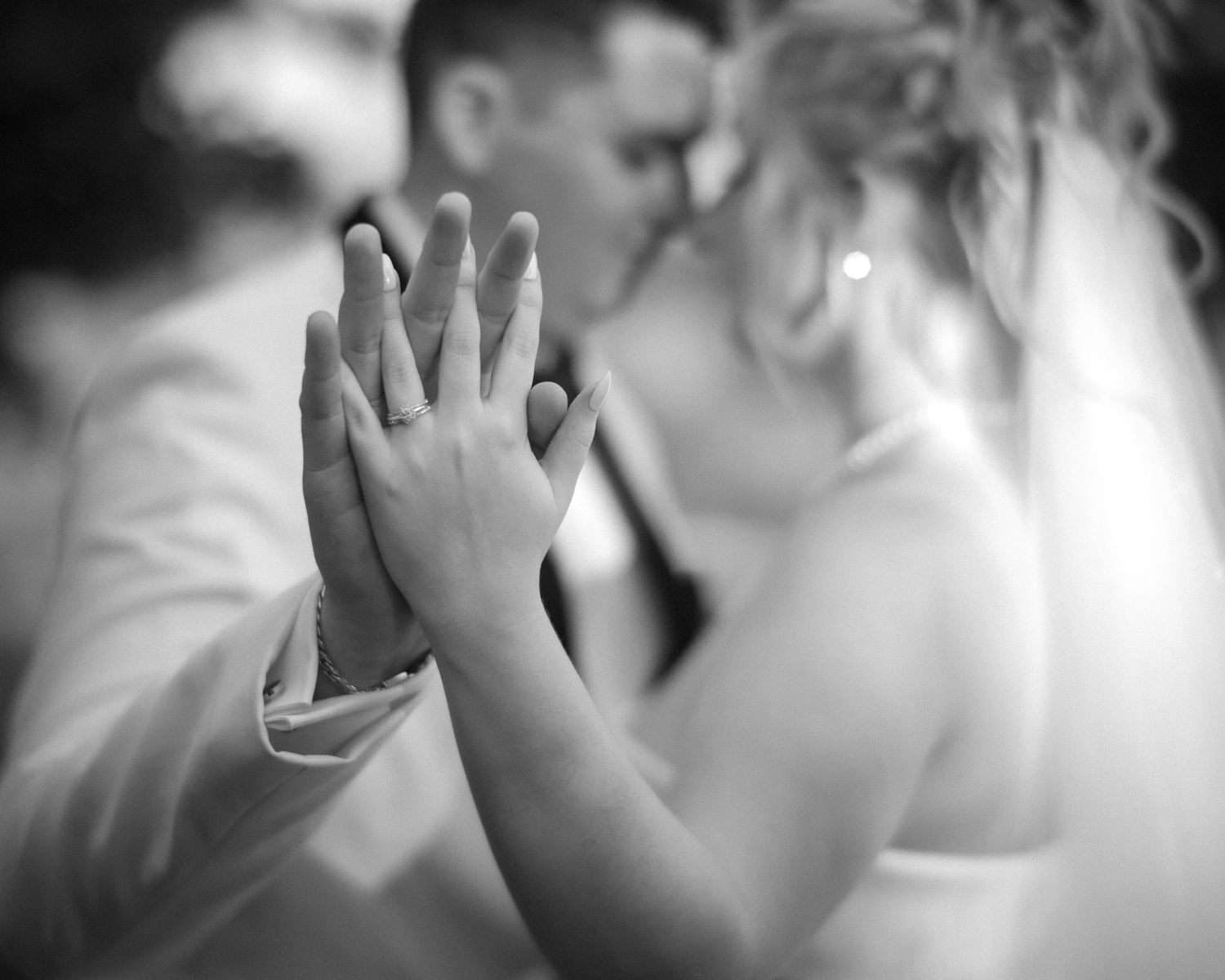 Wedding couple photographed in natural light
Bride and groom embracing during wedding day
Candid moment from a Florida wedding