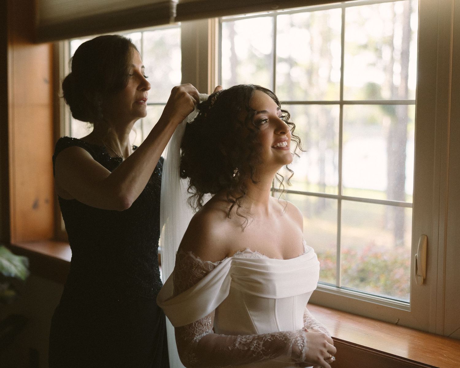 Wedding couple photographed in natural light
Bride and groom embracing during wedding day
Candid moment from a Florida wedding