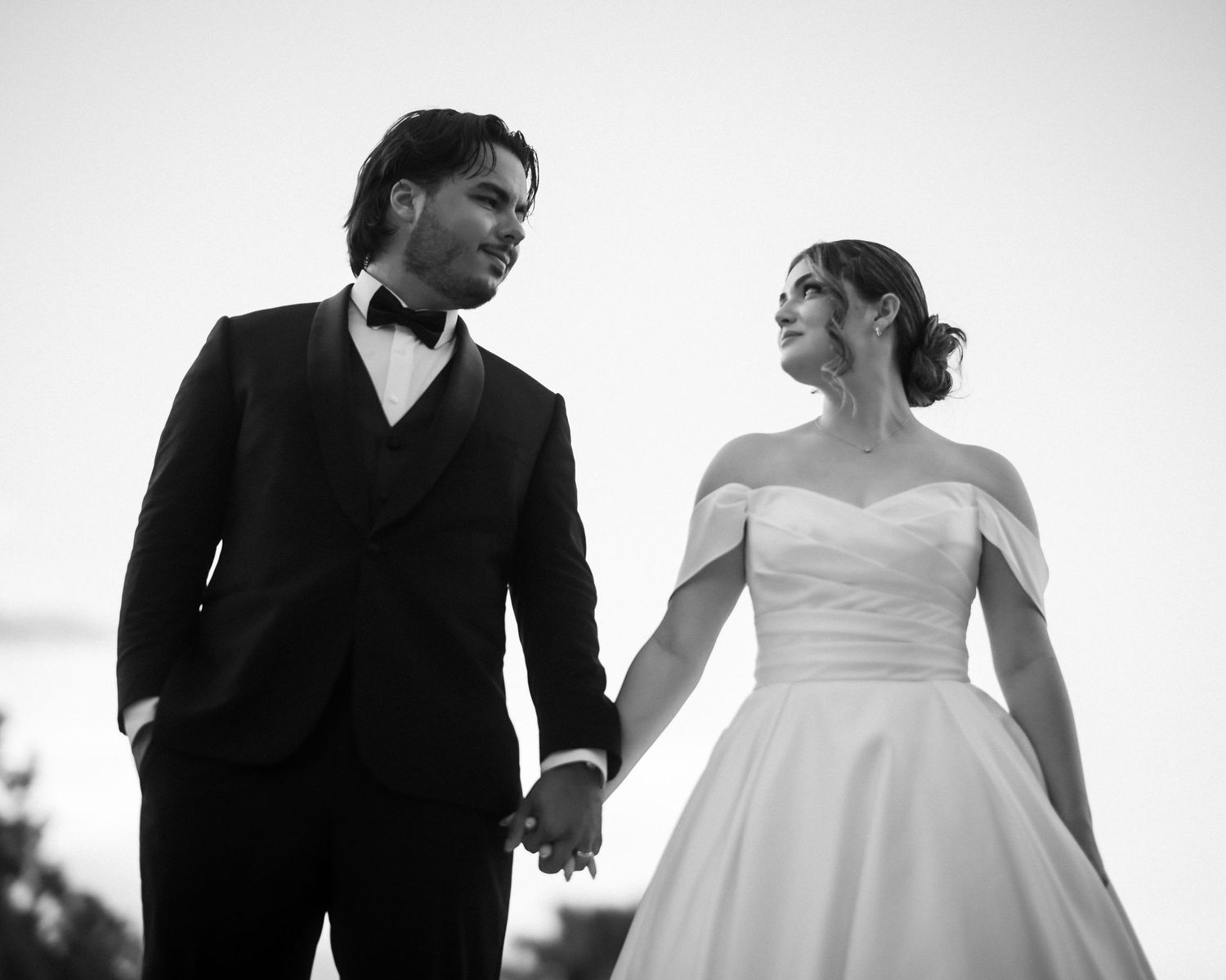 Wedding couple photographed in natural light
Bride and groom embracing during wedding day
Candid moment from a Florida wedding