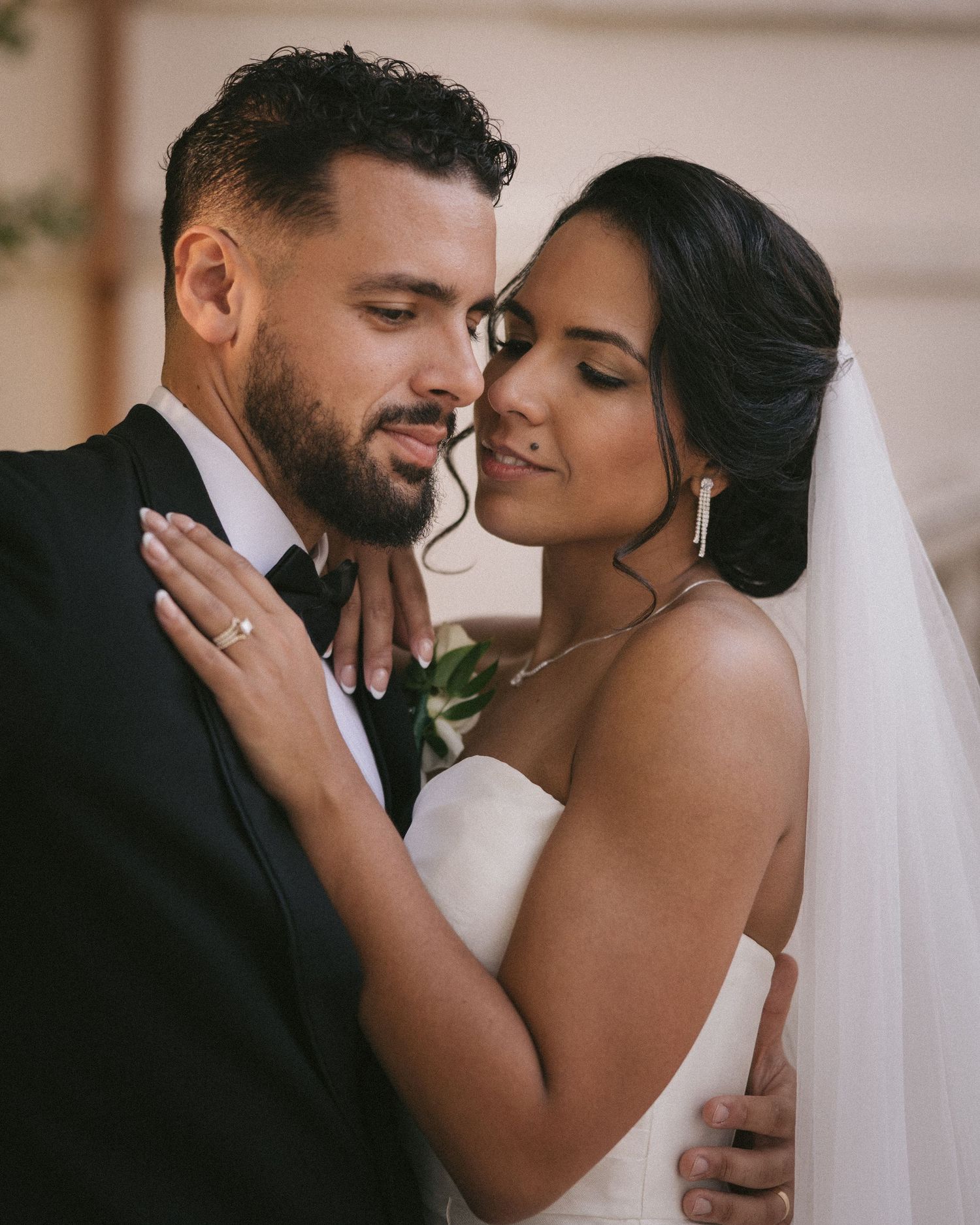Wedding couple photographed in natural light
Bride and groom embracing during wedding day
Candid moment from a Florida wedding