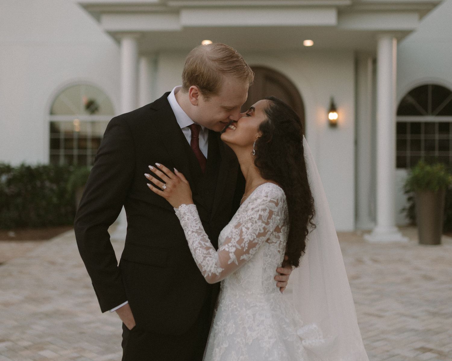 Wedding couple photographed in natural light
Bride and groom embracing during wedding day
Candid moment from a Florida wedding