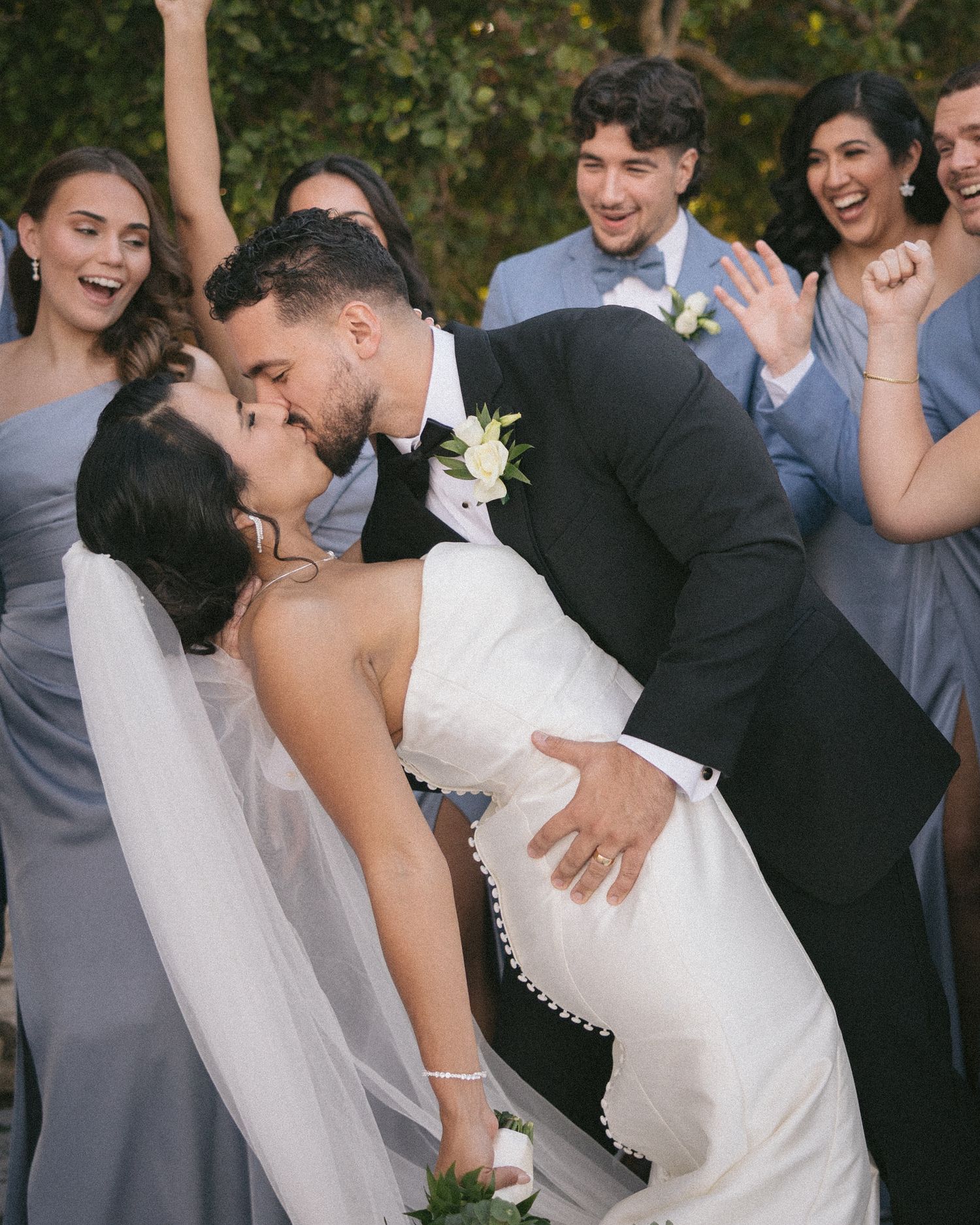 Wedding couple photographed in natural light
Bride and groom embracing during wedding day
Candid moment from a Florida wedding