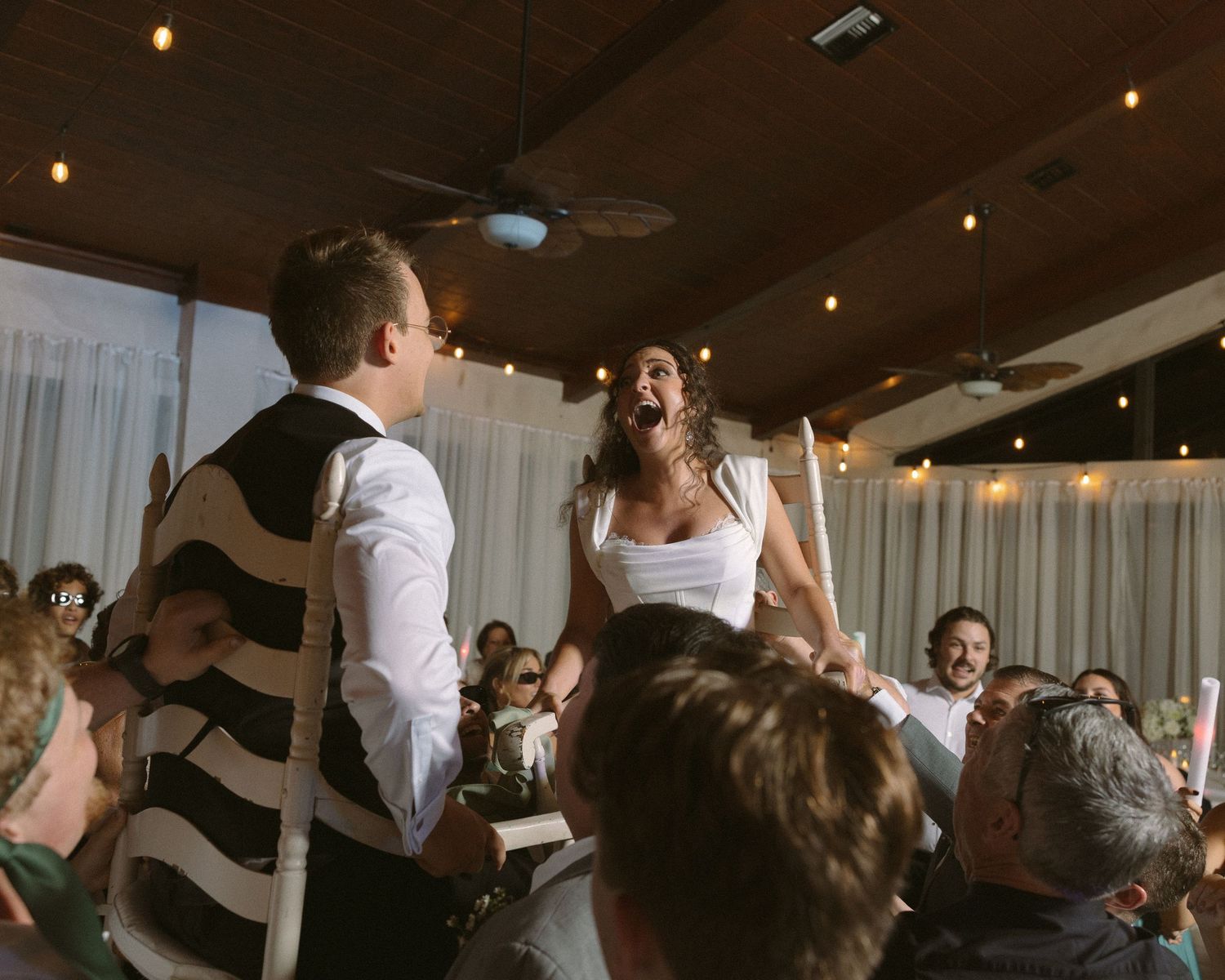 Wedding couple photographed in natural light
Bride and groom embracing during wedding day
Candid moment from a Florida wedding