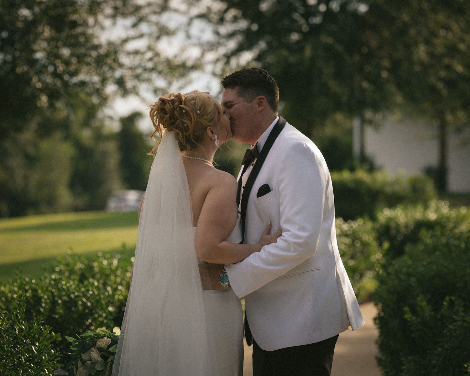 Wedding couple photographed in natural light
Bride and groom embracing during wedding day
Candid moment from a Florida wedding