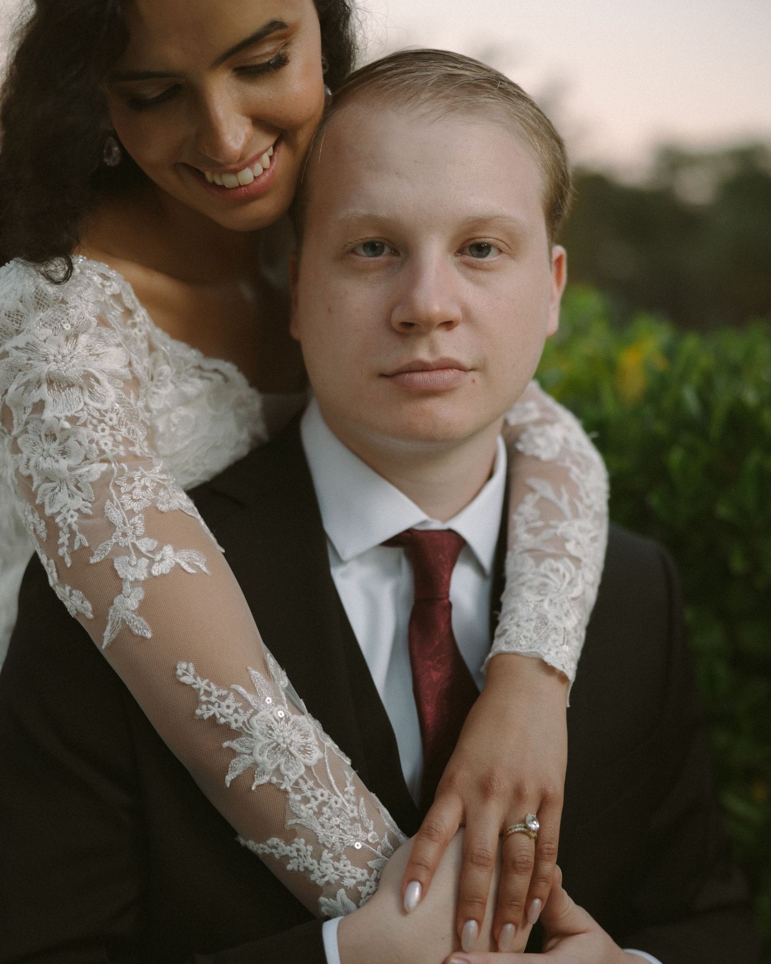Wedding couple photographed in natural light
Bride and groom embracing during wedding day
Candid moment from a Florida wedding