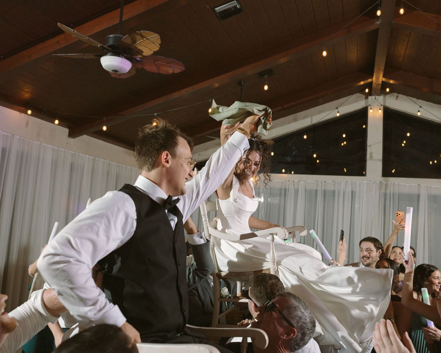 Wedding couple photographed in natural light
Bride and groom embracing during wedding day
Candid moment from a Florida wedding