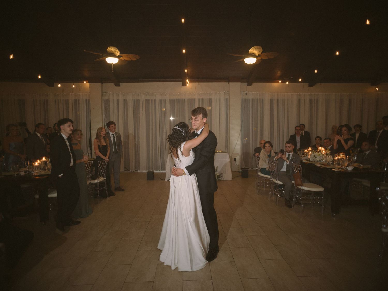 Wedding couple photographed in natural light
Bride and groom embracing during wedding day
Candid moment from a Florida wedding