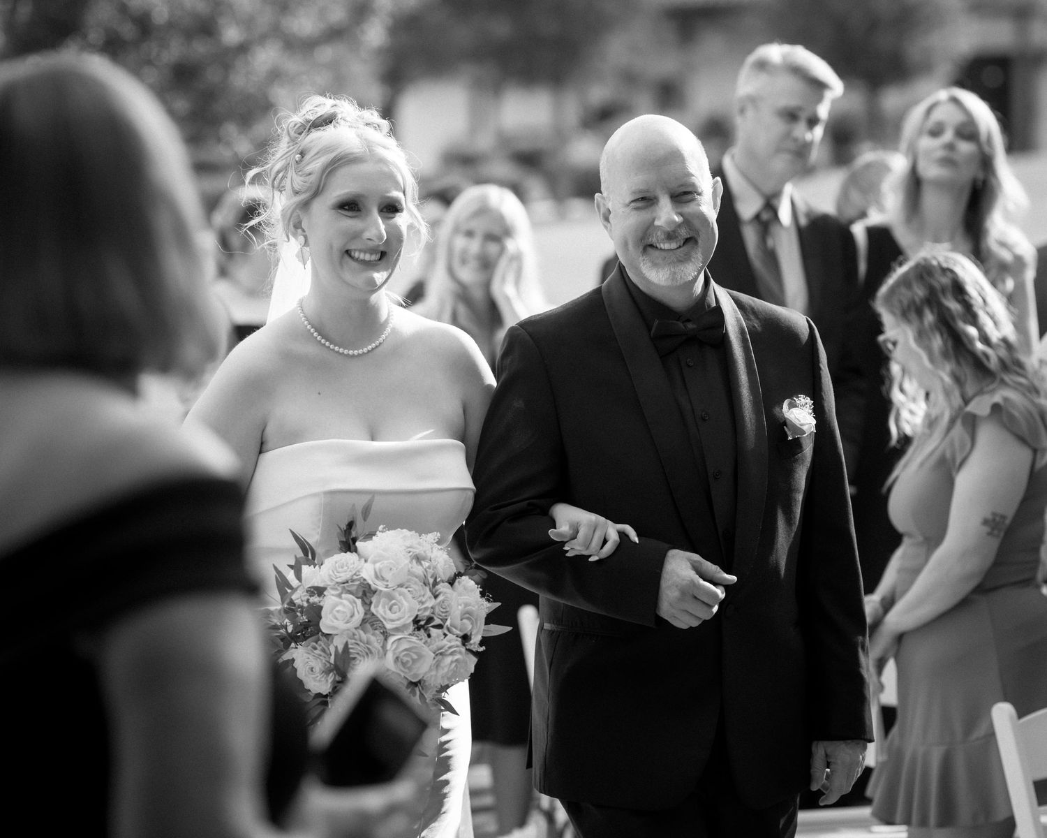 Wedding couple photographed in natural light
Bride and groom embracing during wedding day
Candid moment from a Florida wedding