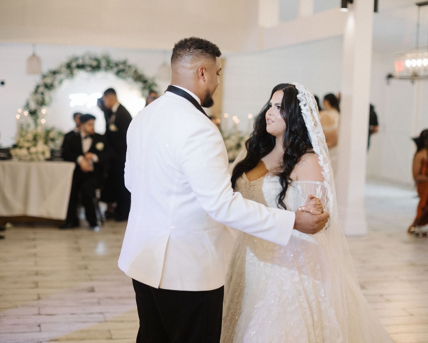 Wedding couple photographed in natural light
Bride and groom embracing during wedding day
Candid moment from a Florida wedding