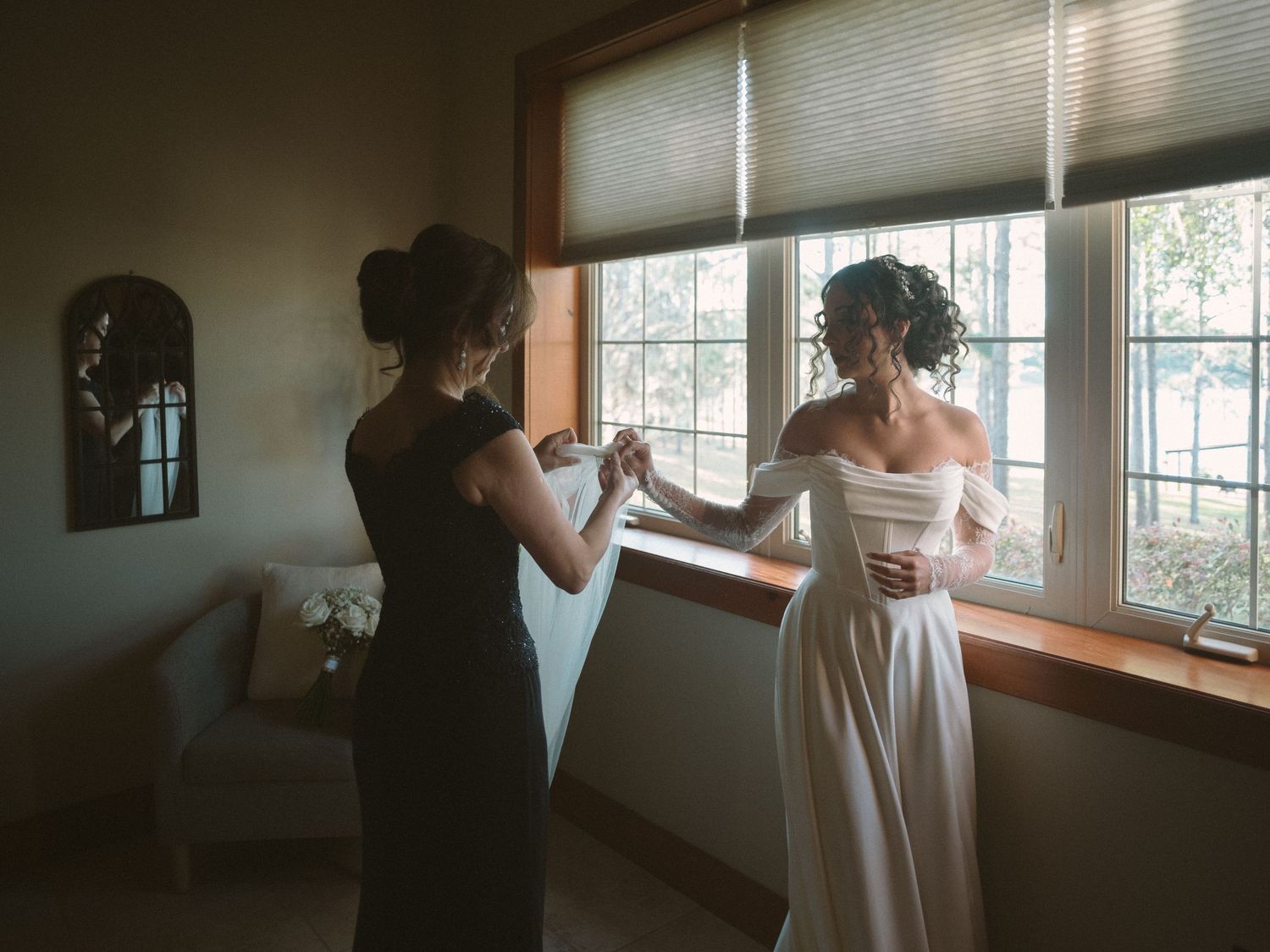 Wedding couple photographed in natural light
Bride and groom embracing during wedding day
Candid moment from a Florida wedding
