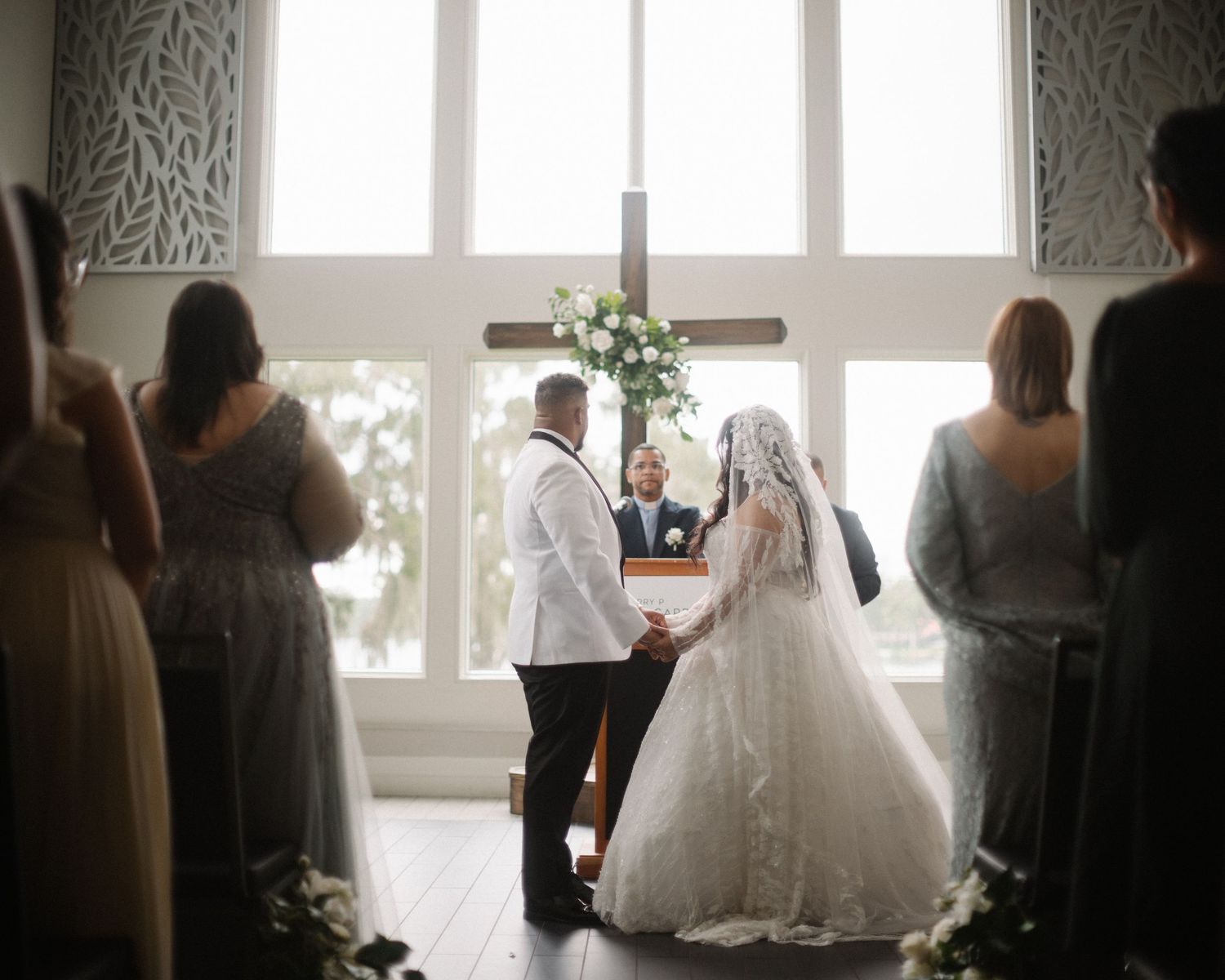 Wedding couple photographed in natural light
Bride and groom embracing during wedding day
Candid moment from a Florida wedding
