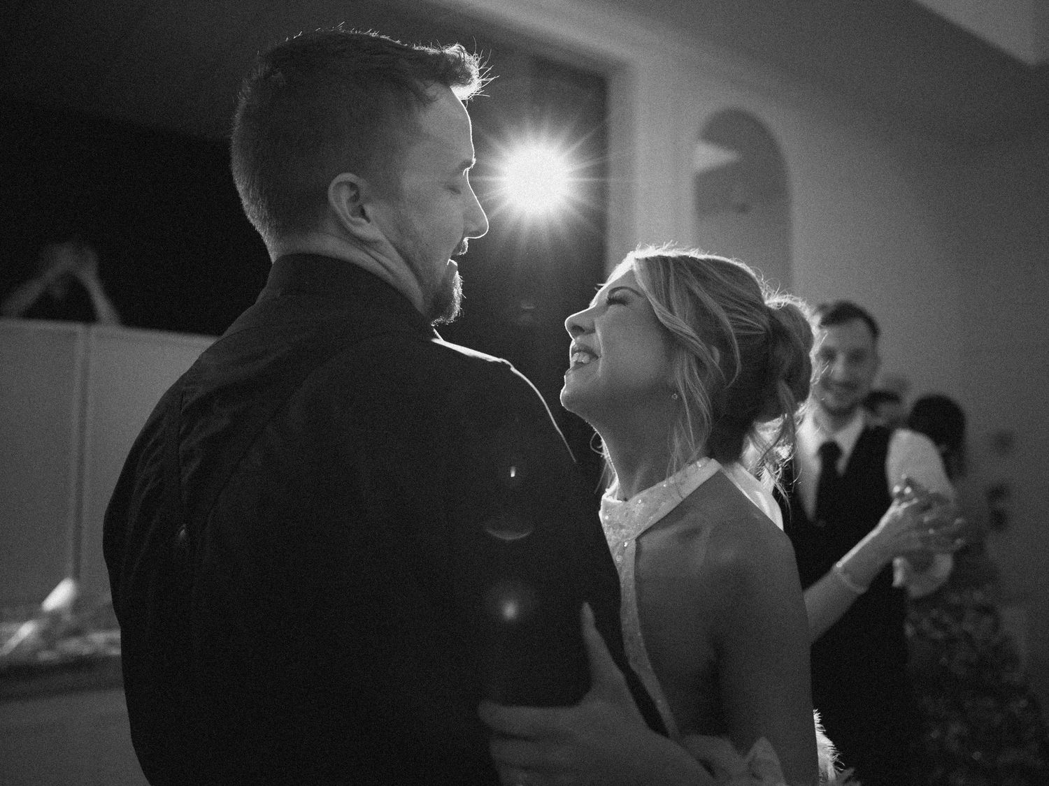 Wedding couple photographed in natural light
Bride and groom embracing during wedding day
Candid moment from a Florida wedding