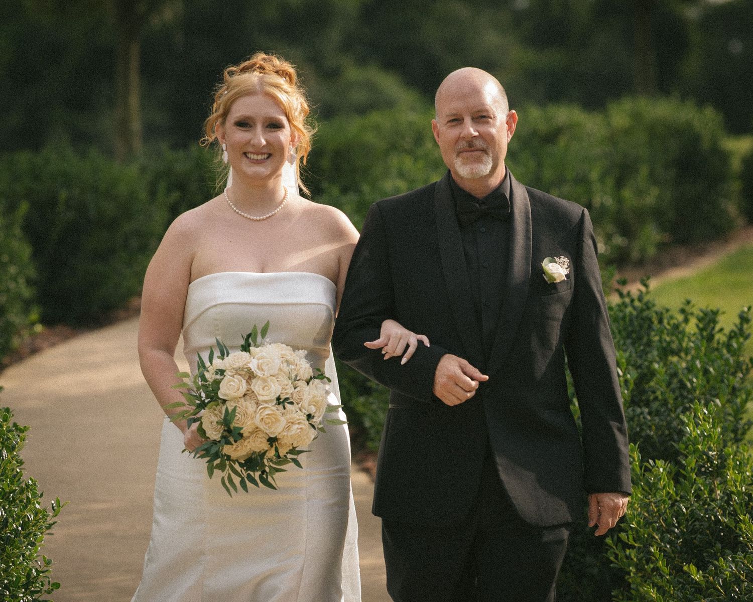 Wedding couple photographed in natural light
Bride and groom embracing during wedding day
Candid moment from a Florida wedding