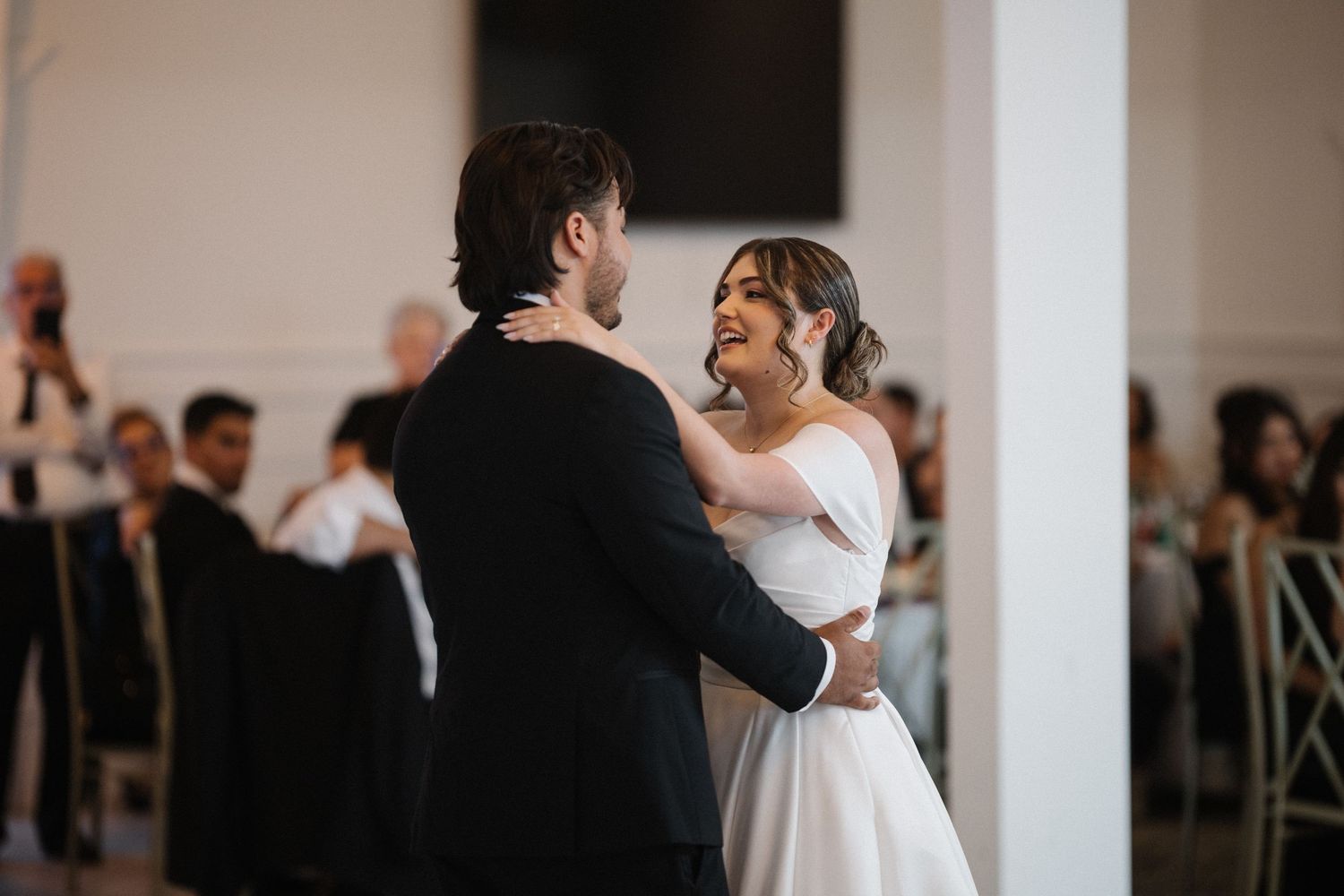 Wedding couple photographed in natural light
Bride and groom embracing during wedding day
Candid moment from a Florida wedding