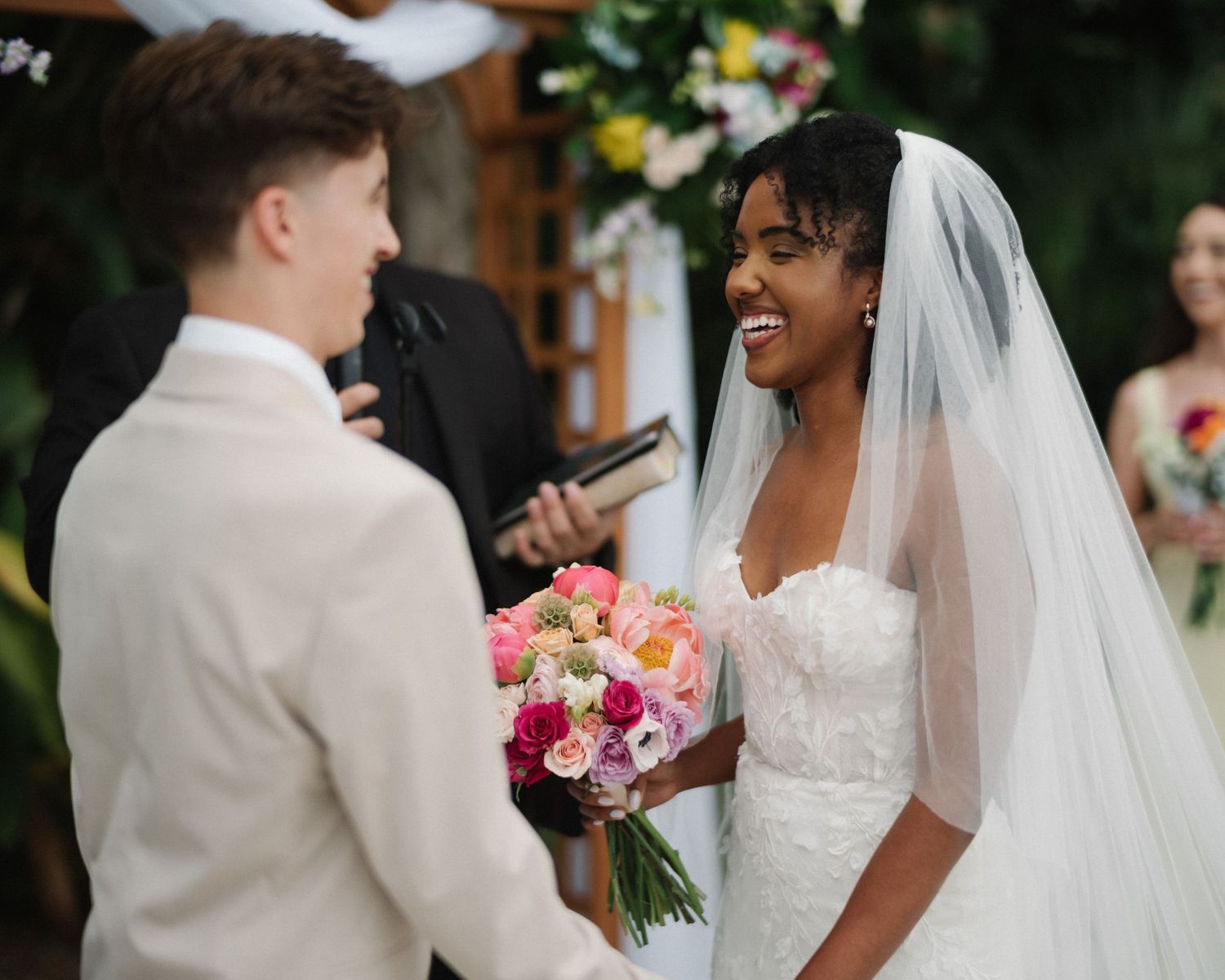 Wedding couple photographed in natural light
Bride and groom embracing during wedding day
Candid moment from a Florida wedding