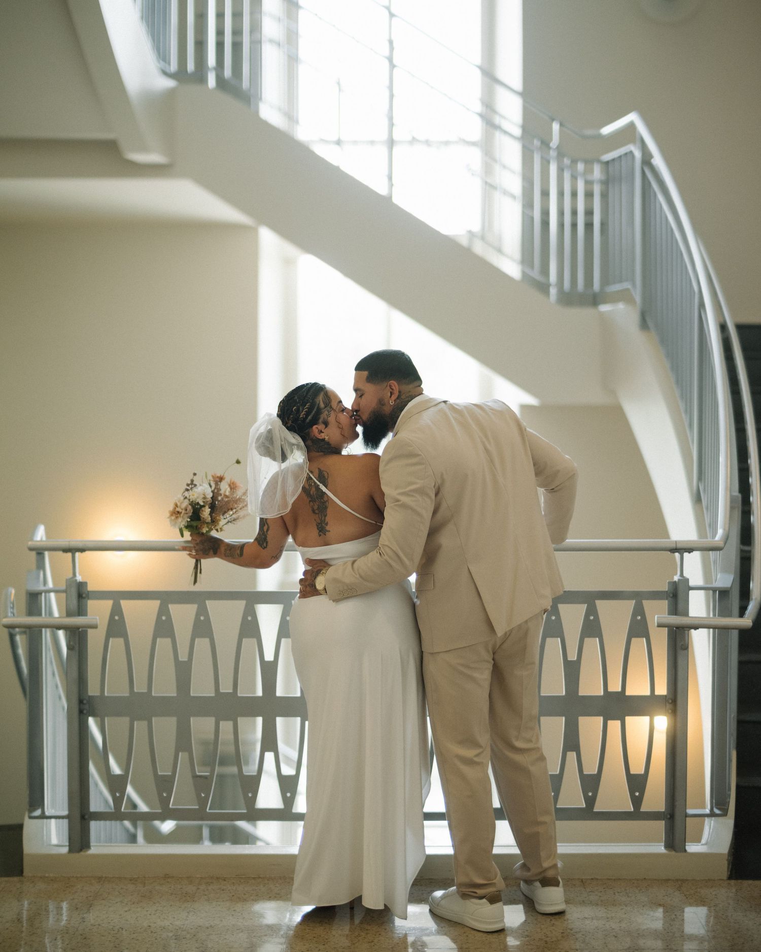 Wedding couple photographed in natural light
Bride and groom embracing during wedding day
Candid moment from a Florida wedding