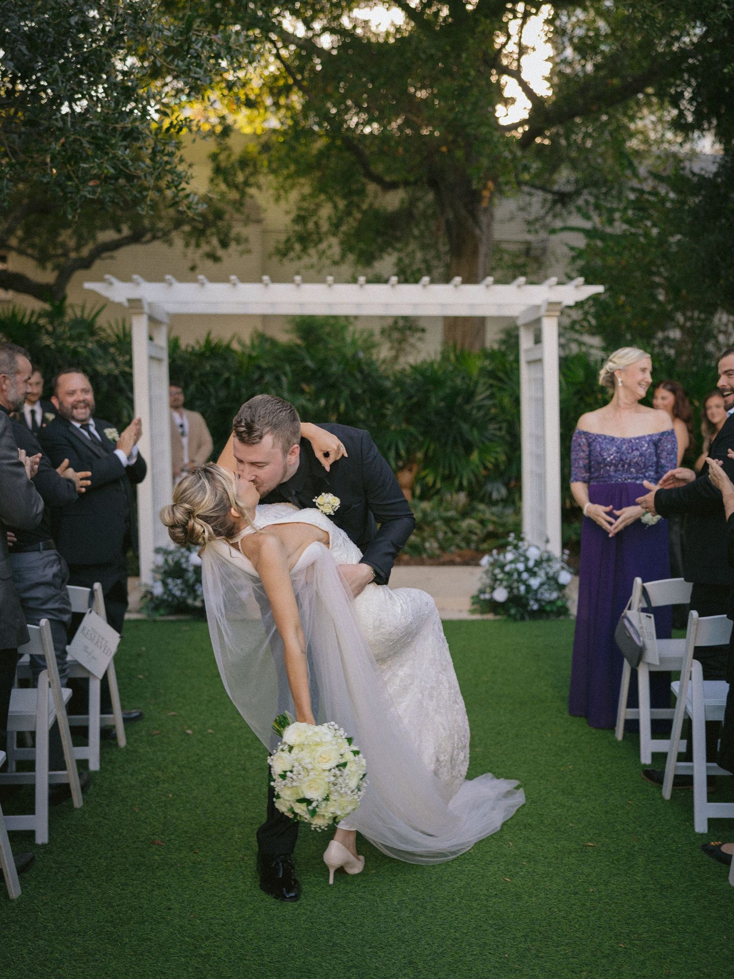 Wedding couple photographed in natural light
Bride and groom embracing during wedding day
Candid moment from a Florida wedding