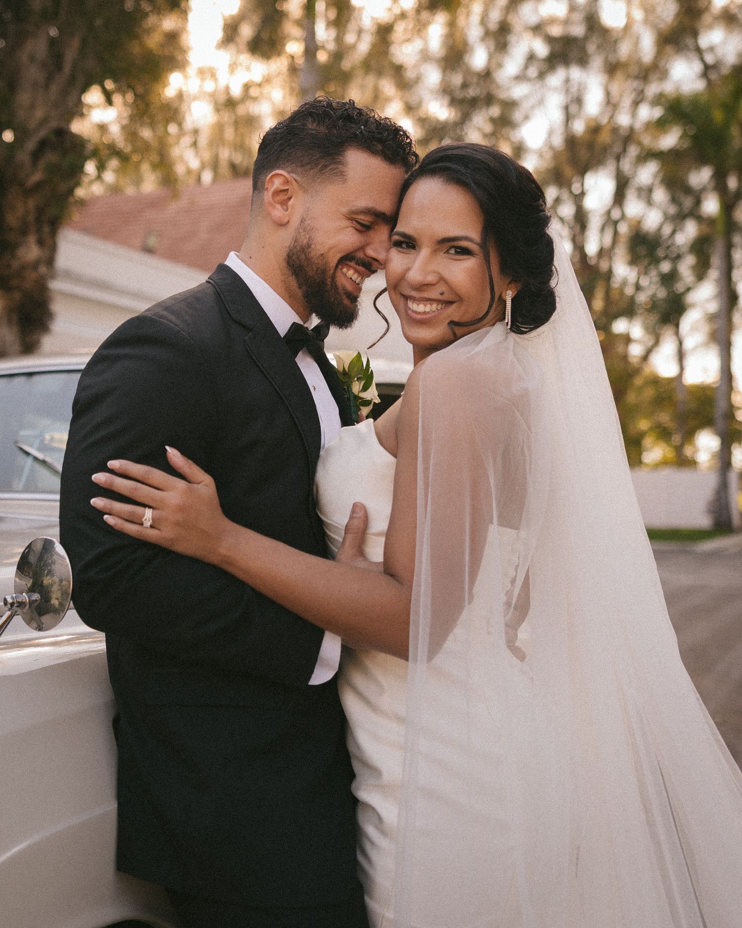 Wedding couple photographed in natural light
Bride and groom embracing during wedding day
Candid moment from a Florida wedding