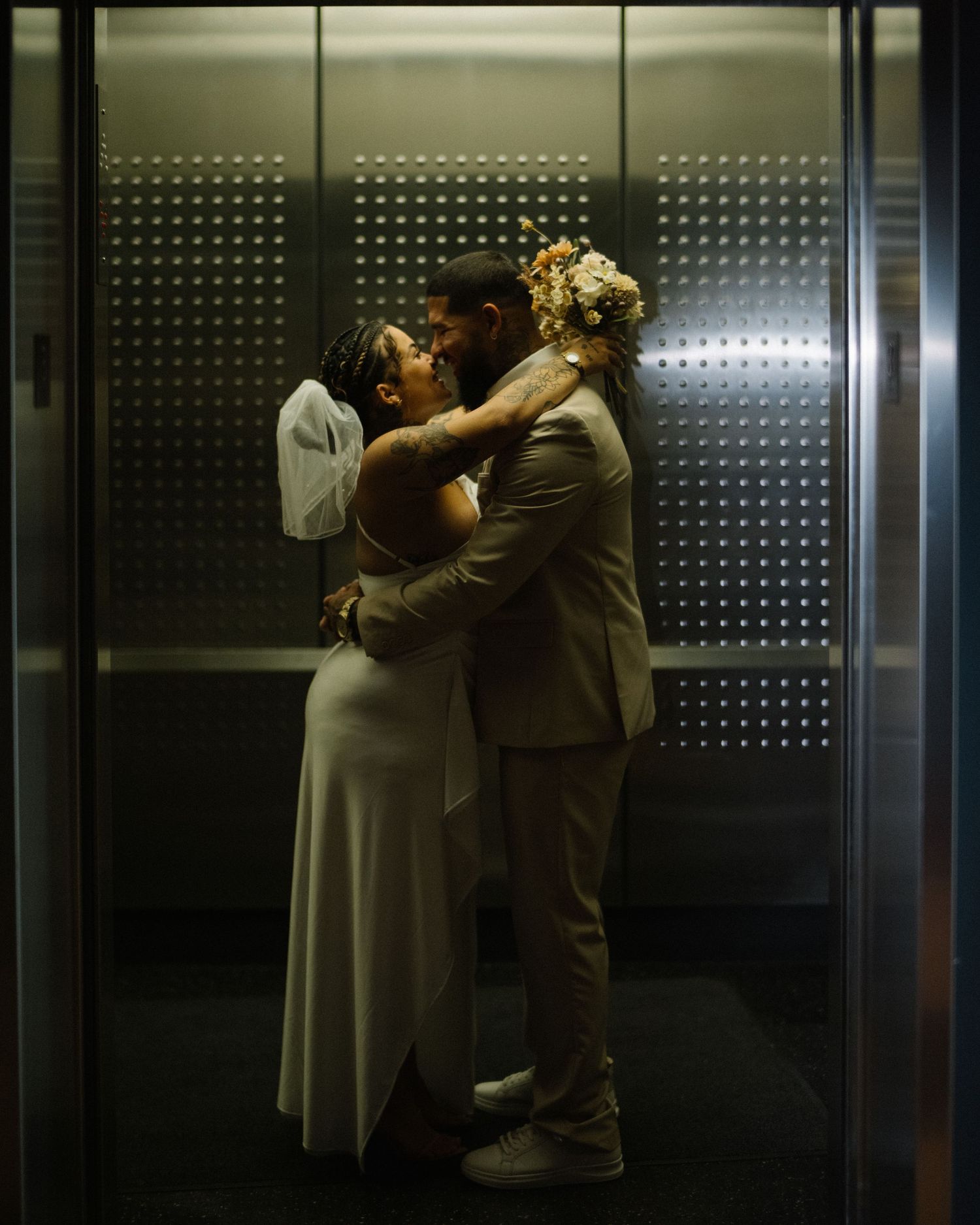 Wedding couple photographed in natural light
Bride and groom embracing during wedding day
Candid moment from a Florida wedding