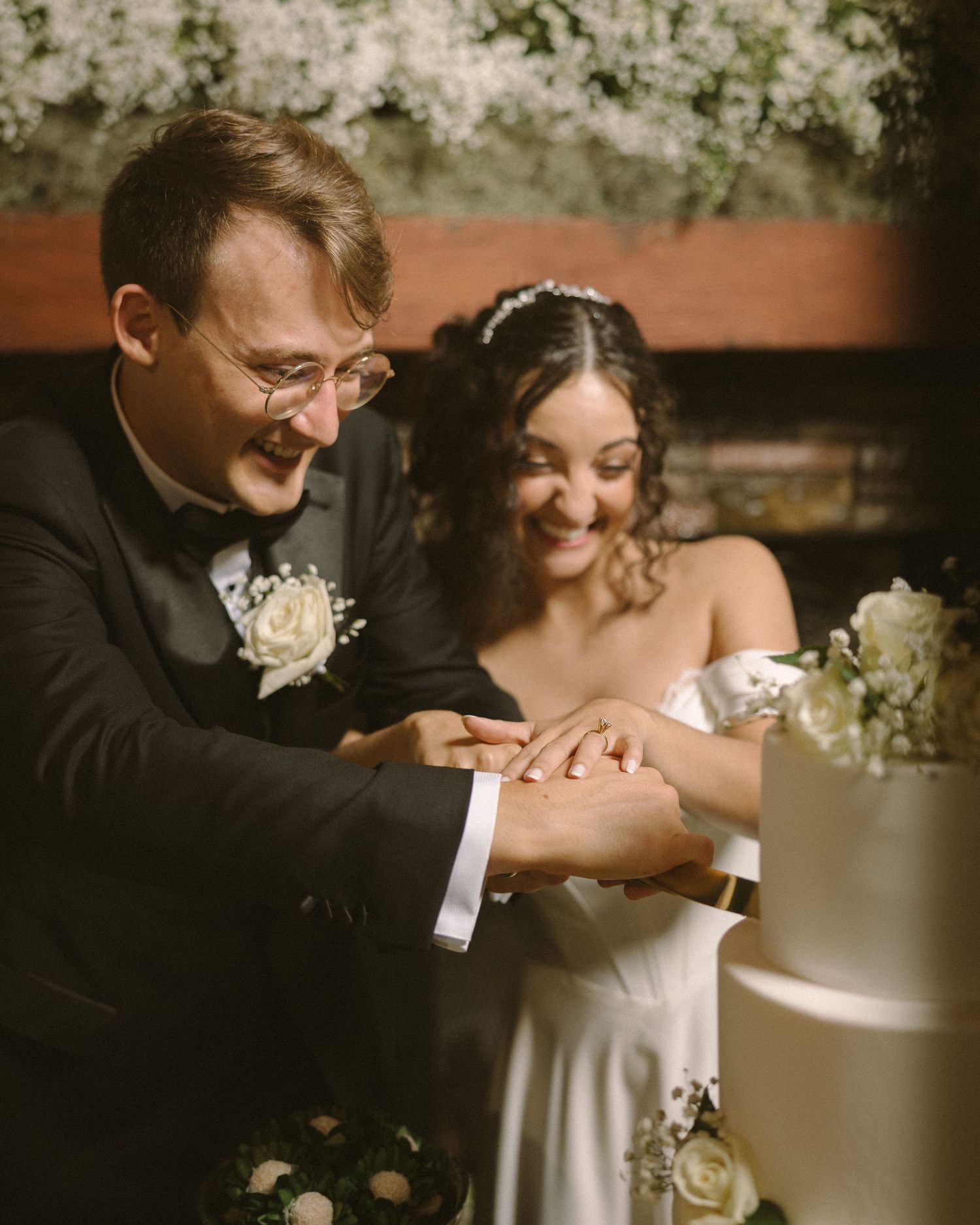 Wedding couple photographed in natural light
Bride and groom embracing during wedding day
Candid moment from a Florida wedding