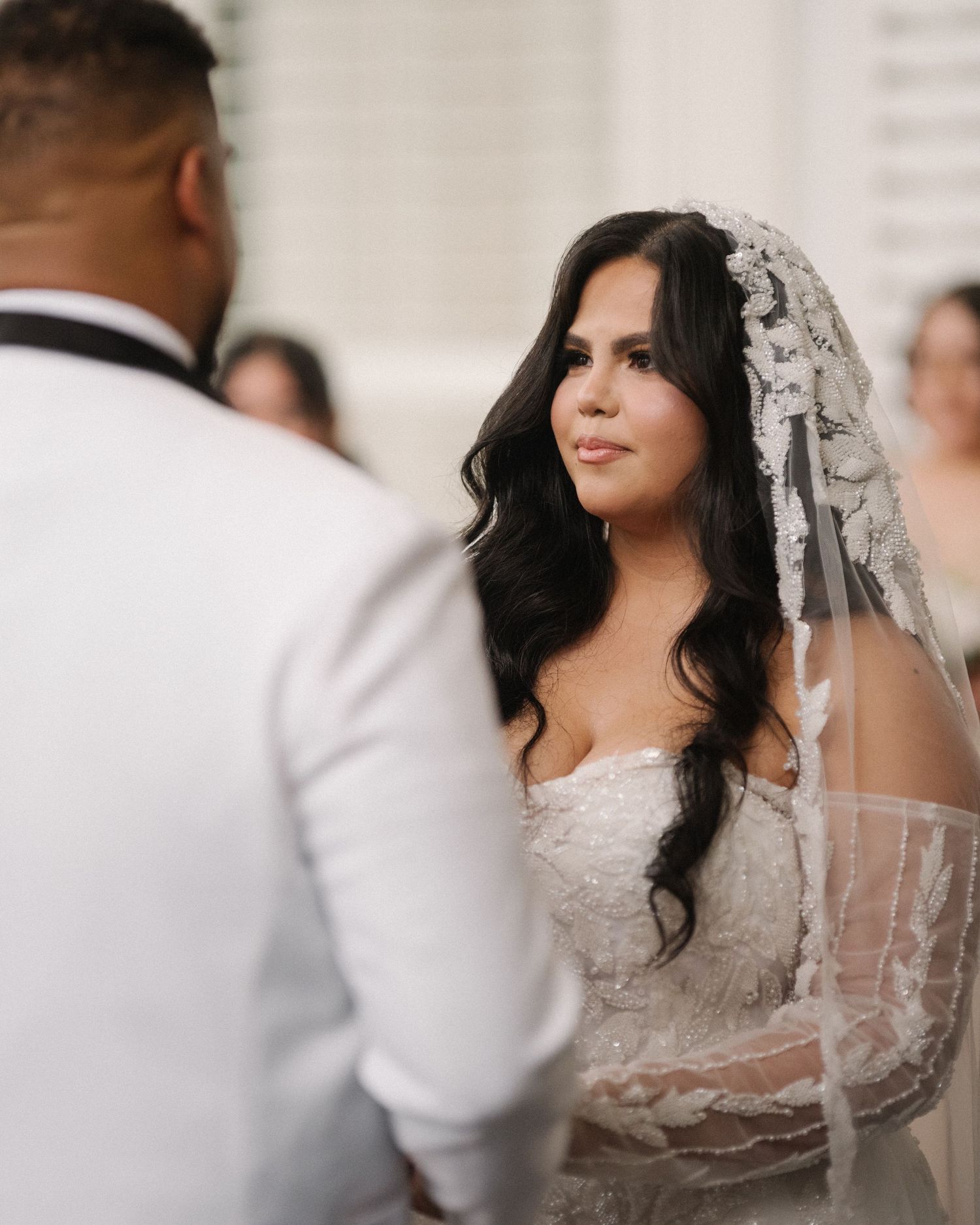 Wedding couple photographed in natural light
Bride and groom embracing during wedding day
Candid moment from a Florida wedding