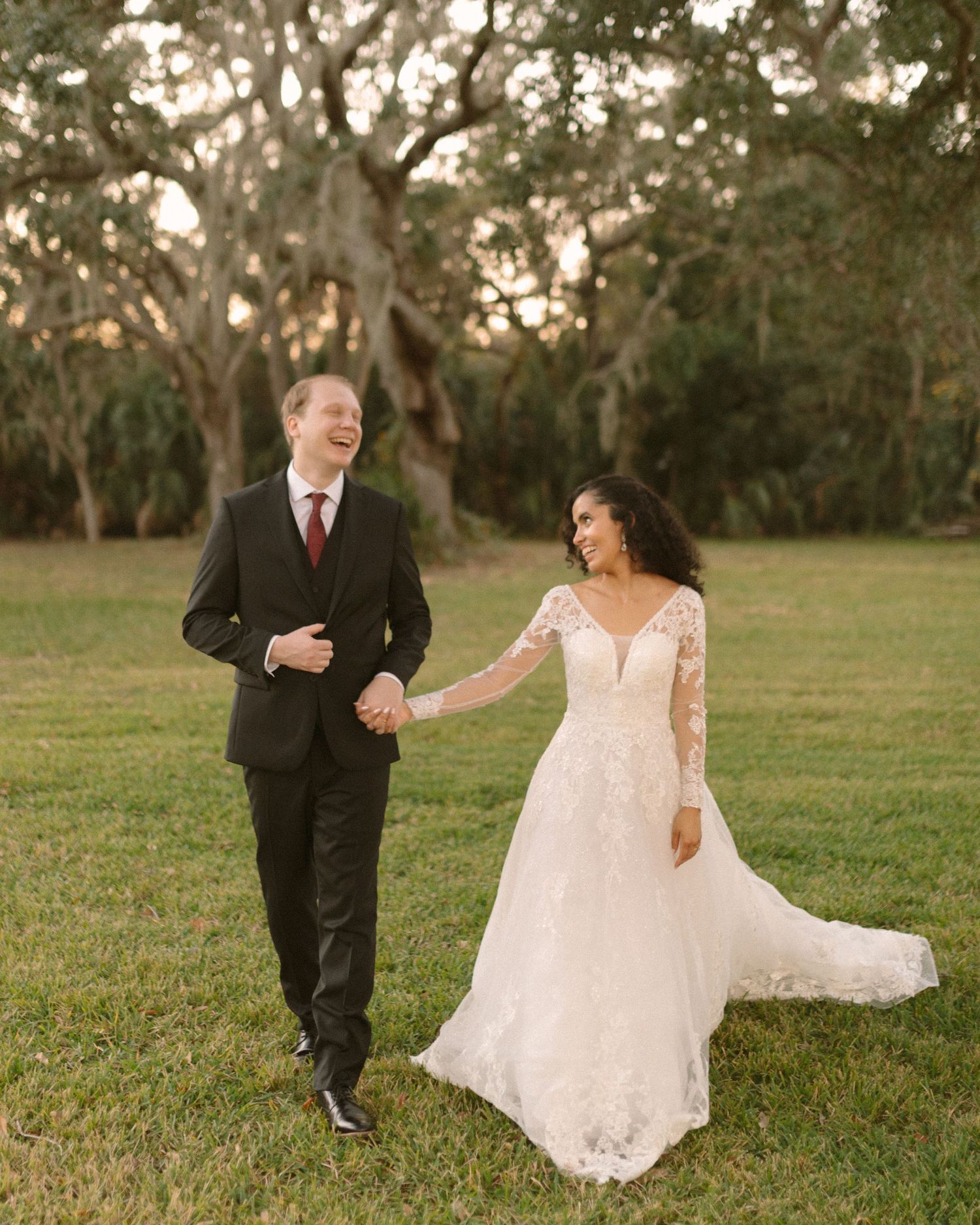 Bride and groom walk down the aisle together after the ceremony, celebrating with friends and family.