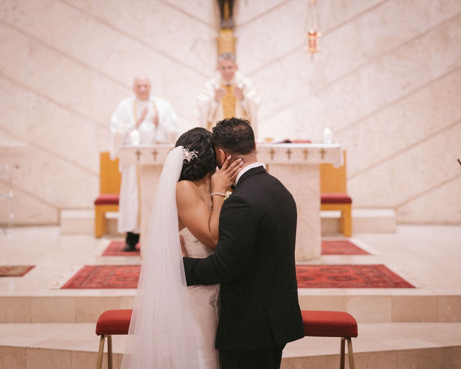 Wedding couple photographed in natural light
Bride and groom embracing during wedding day
Candid moment from a Florida wedding