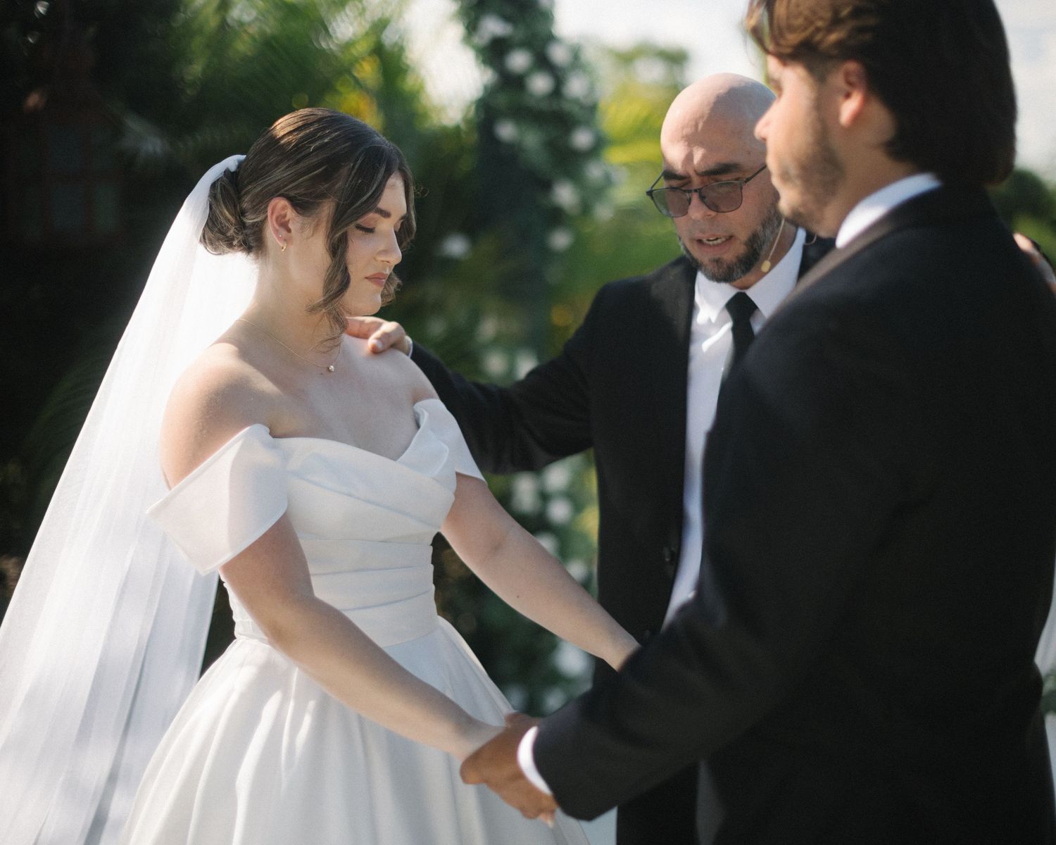 Wedding couple photographed in natural light
Bride and groom embracing during wedding day
Candid moment from a Florida wedding