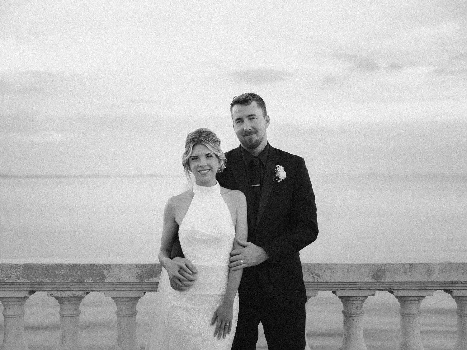 Wedding couple photographed in natural light
Bride and groom embracing during wedding day
Candid moment from a Florida wedding