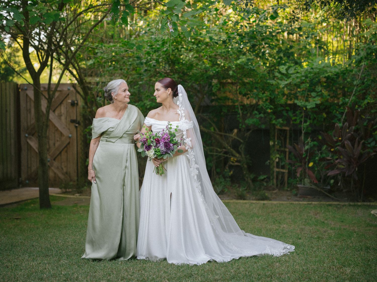 Wedding couple photographed in natural light
Bride and groom embracing during wedding day
Candid moment from a Florida wedding