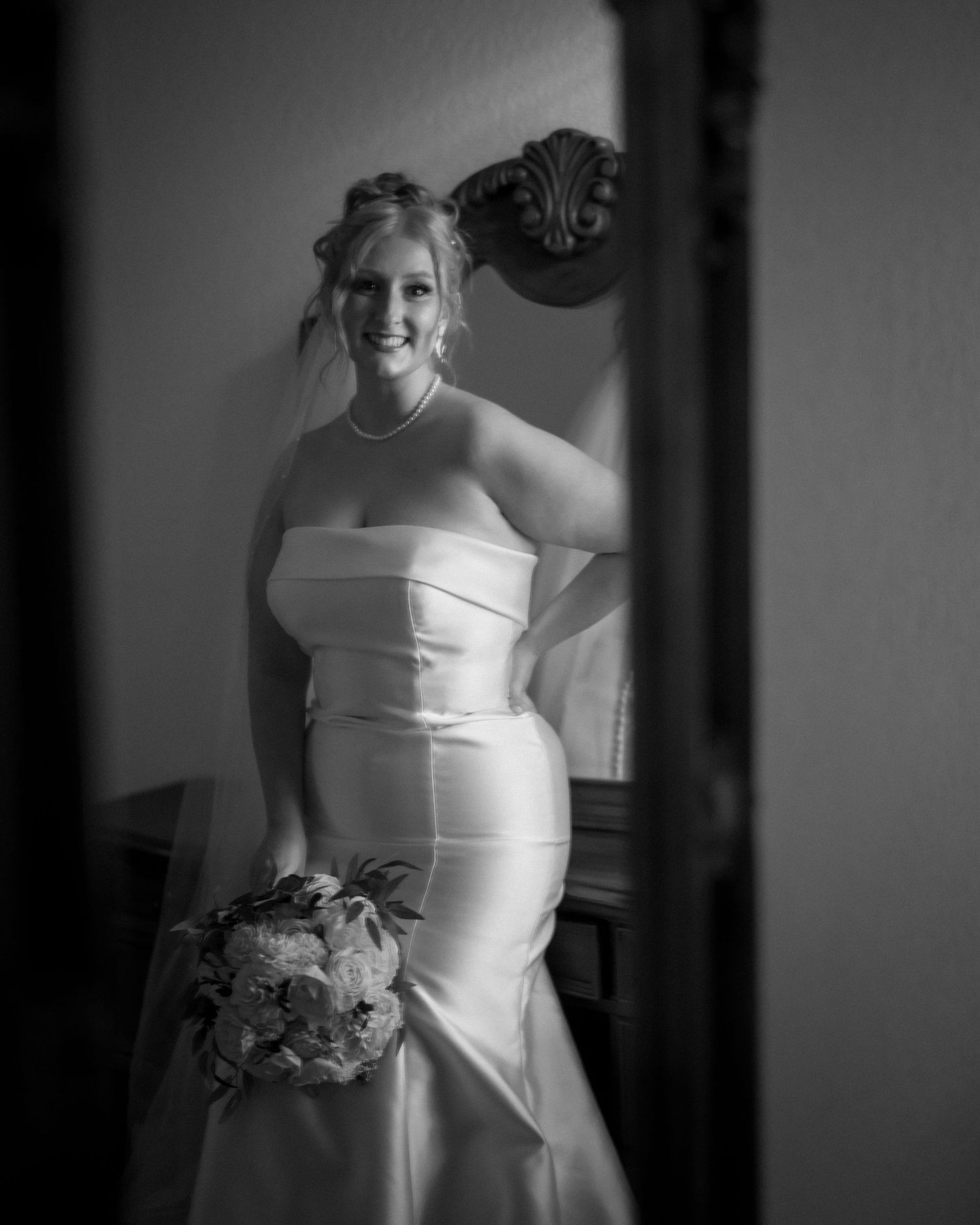 Wedding couple photographed in natural light
Bride and groom embracing during wedding day
Candid moment from a Florida wedding