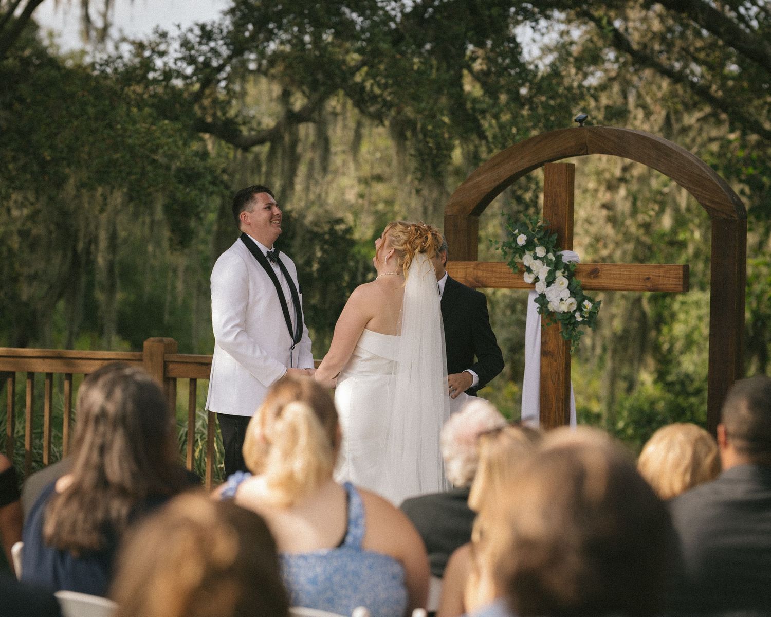 Wedding couple photographed in natural light
Bride and groom embracing during wedding day
Candid moment from a Florida wedding