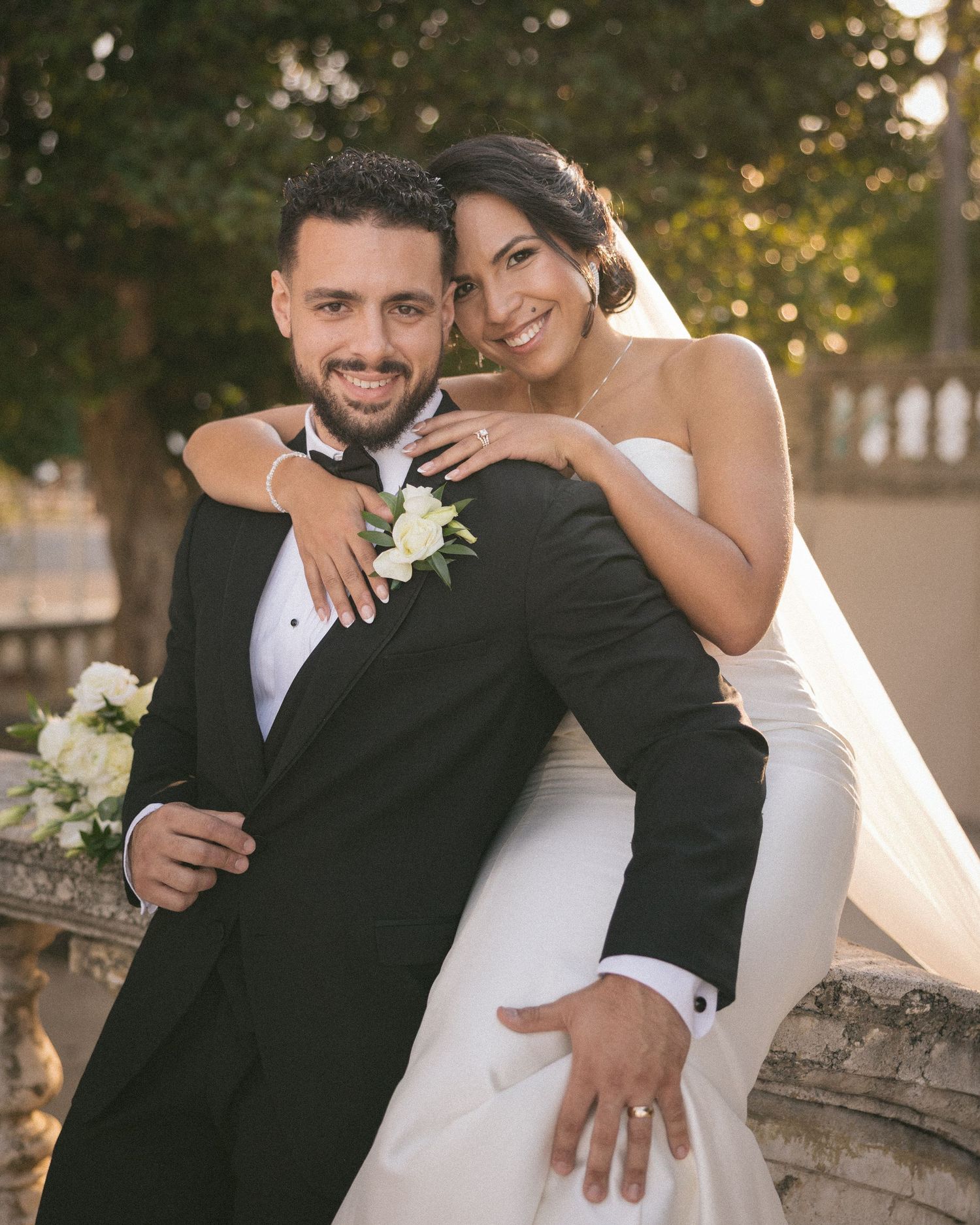 Wedding couple photographed in natural light
Bride and groom embracing during wedding day
Candid moment from a Florida wedding