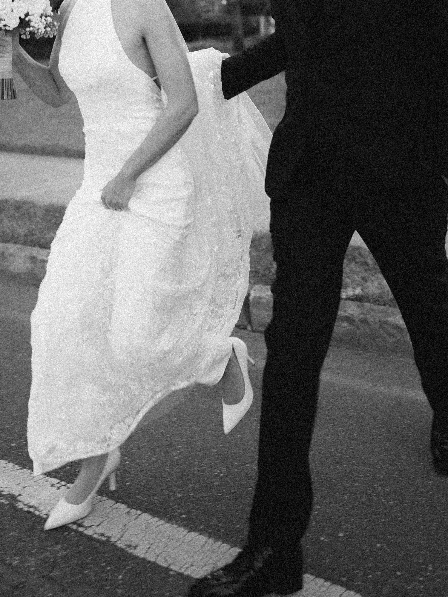 Wedding couple photographed in natural light
Bride and groom embracing during wedding day
Candid moment from a Florida wedding
