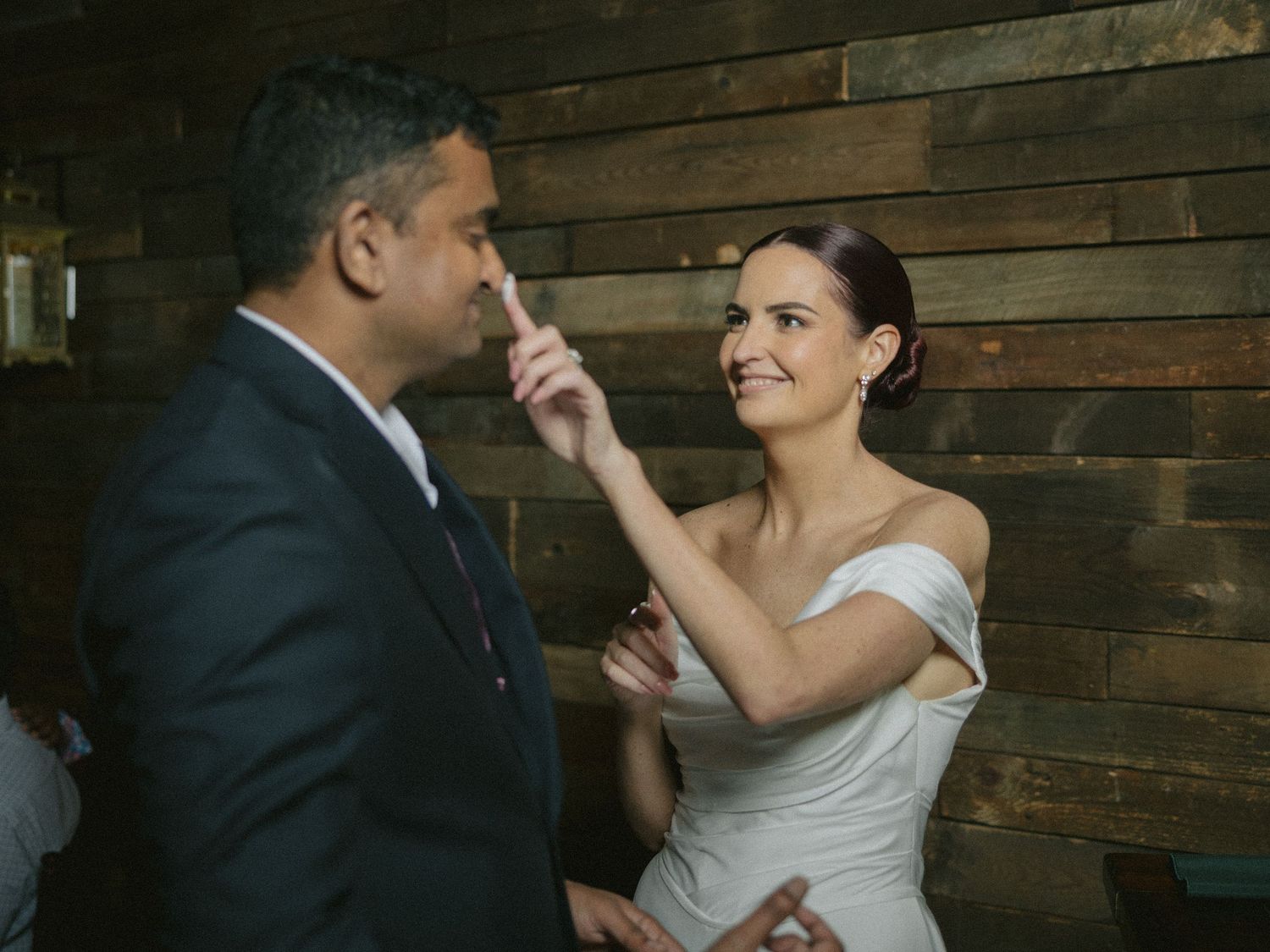Wedding couple photographed in natural light
Bride and groom embracing during wedding day
Candid moment from a Florida wedding