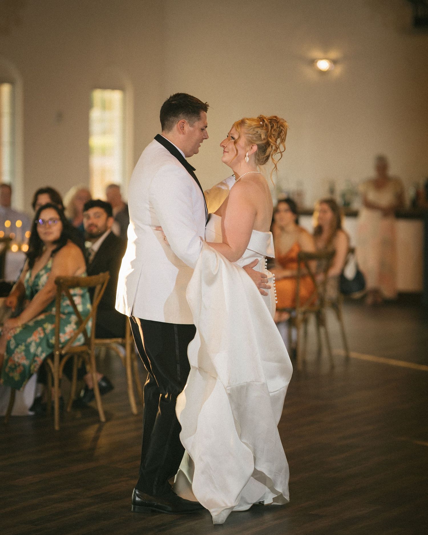 Wedding couple photographed in natural light
Bride and groom embracing during wedding day
Candid moment from a Florida wedding