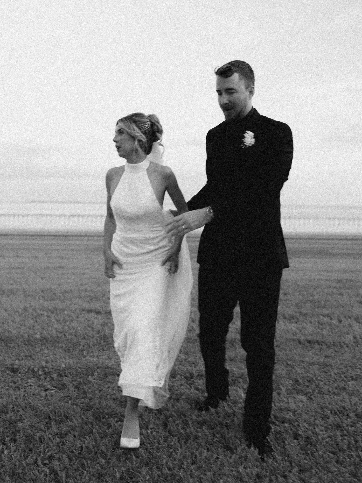 Wedding couple photographed in natural light
Bride and groom embracing during wedding day
Candid moment from a Florida wedding