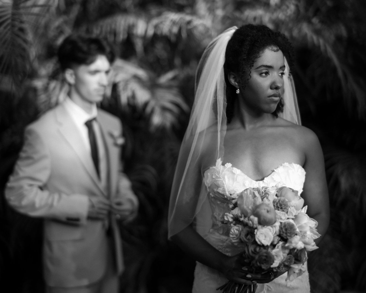 Wedding couple photographed in natural light
Bride and groom embracing during wedding day
Candid moment from a Florida wedding