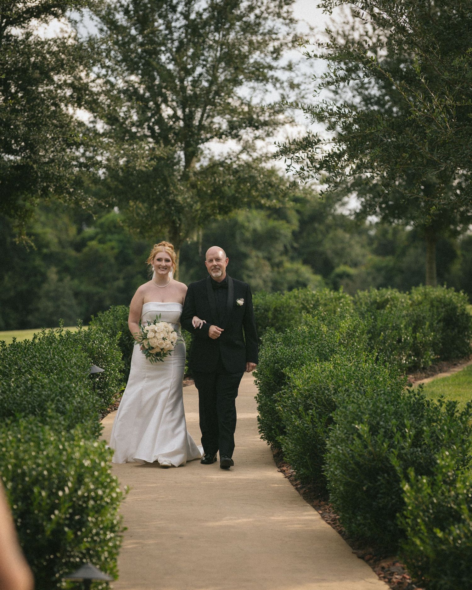 Wedding couple photographed in natural light
Bride and groom embracing during wedding day
Candid moment from a Florida wedding