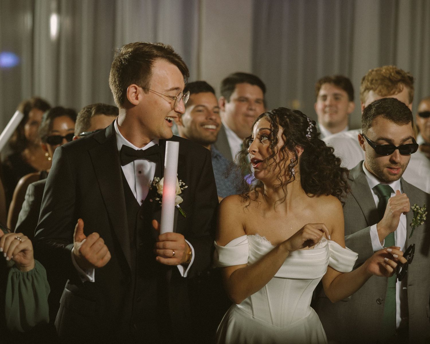 Wedding couple photographed in natural light
Bride and groom embracing during wedding day
Candid moment from a Florida wedding