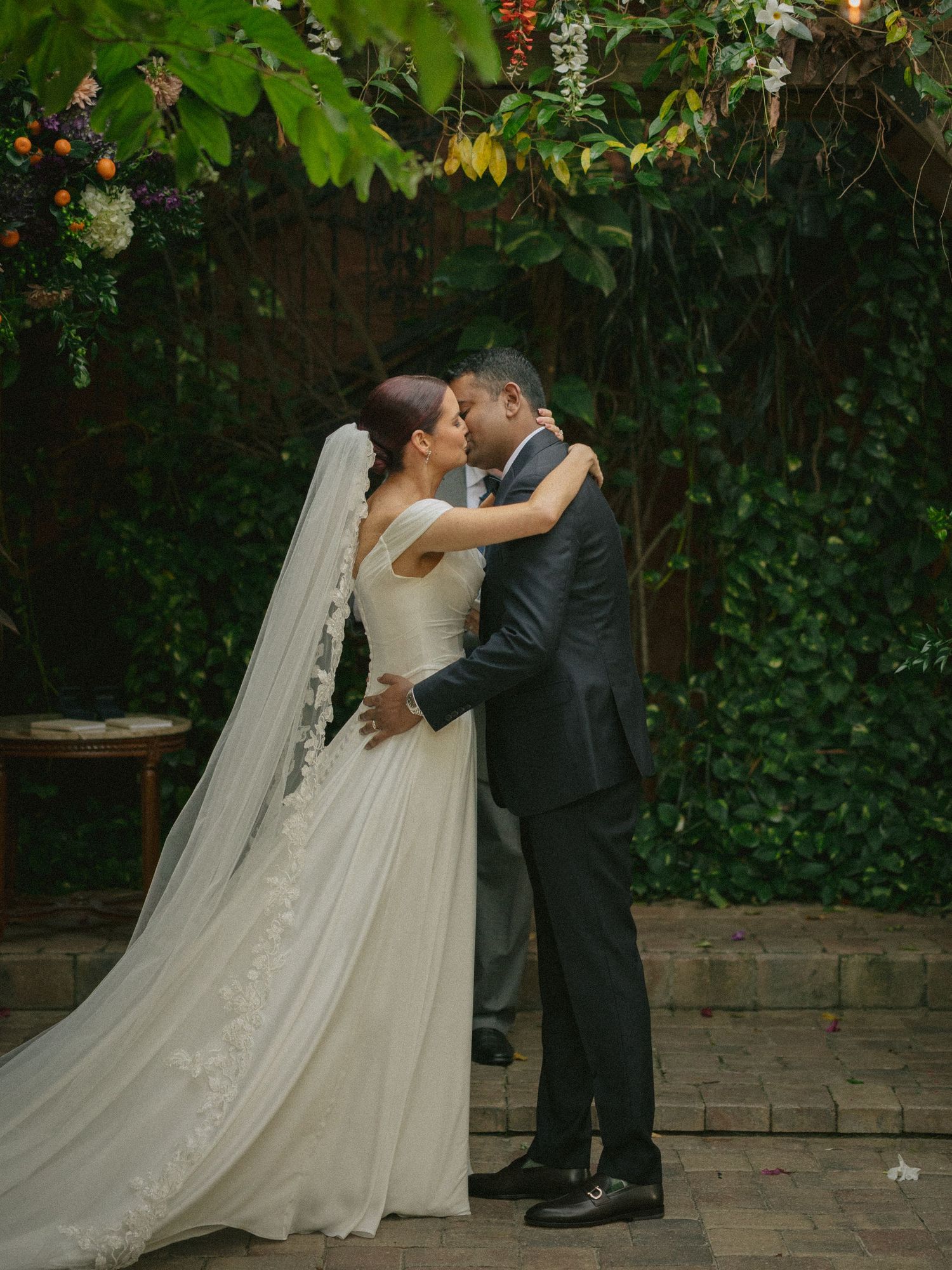 Wedding couple photographed in natural light
Bride and groom embracing during wedding day
Candid moment from a Florida wedding