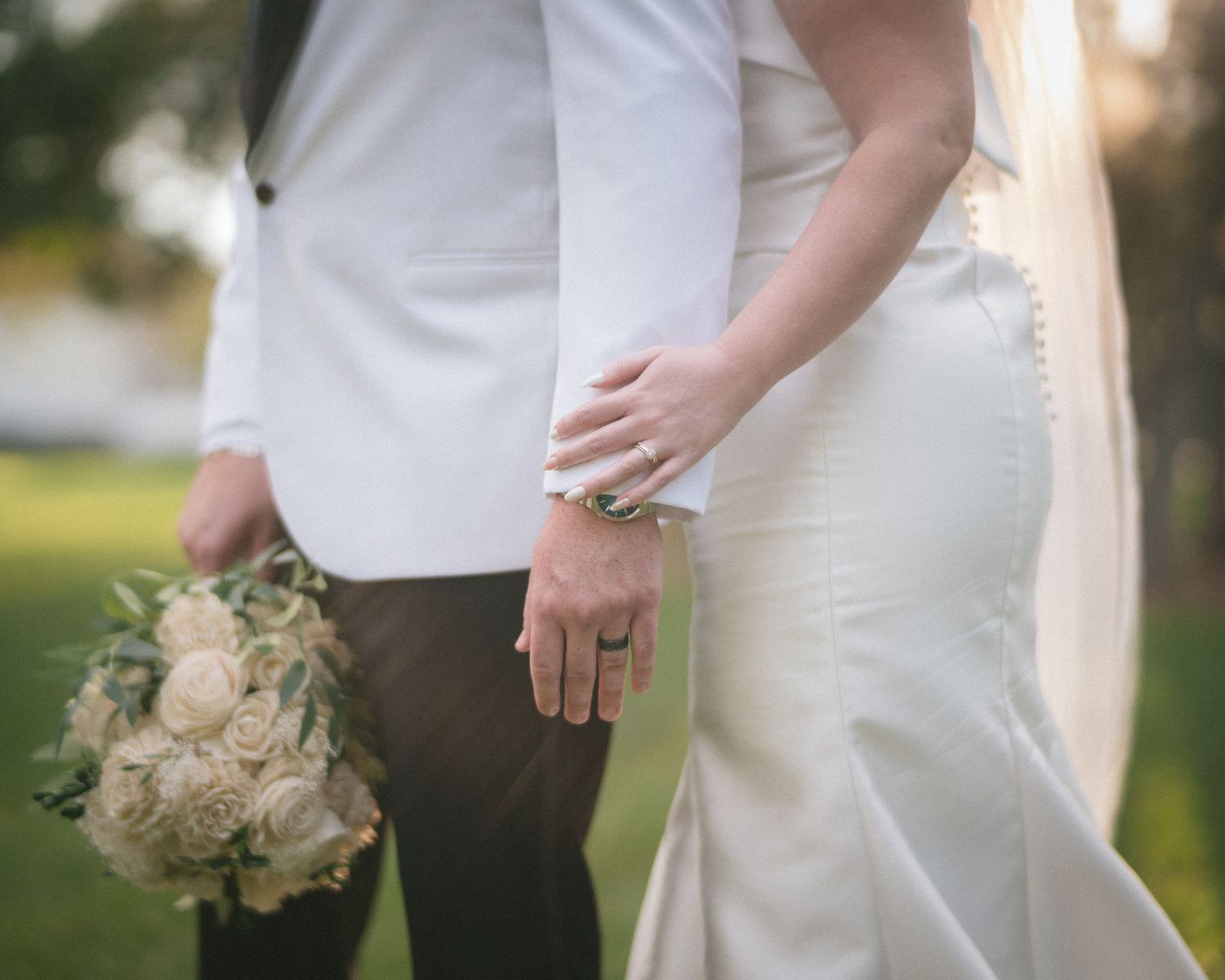 Wedding couple photographed in natural light
Bride and groom embracing during wedding day
Candid moment from a Florida wedding
