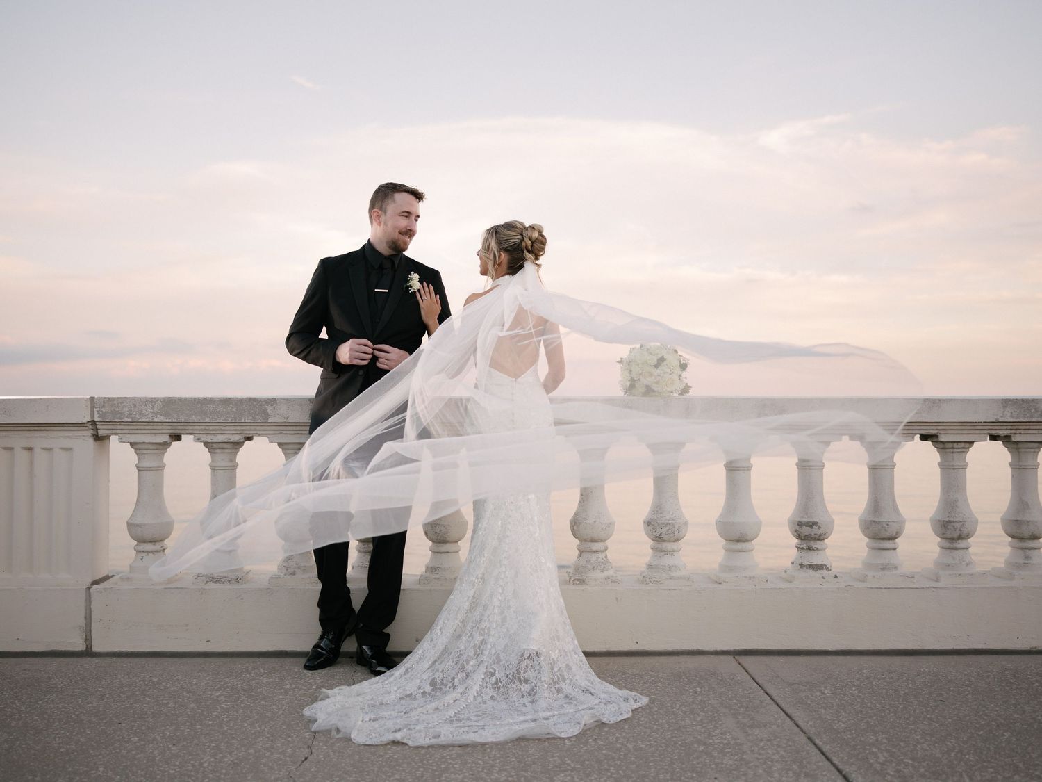 Wedding couple photographed in natural light
Bride and groom embracing during wedding day
Candid moment from a Florida wedding